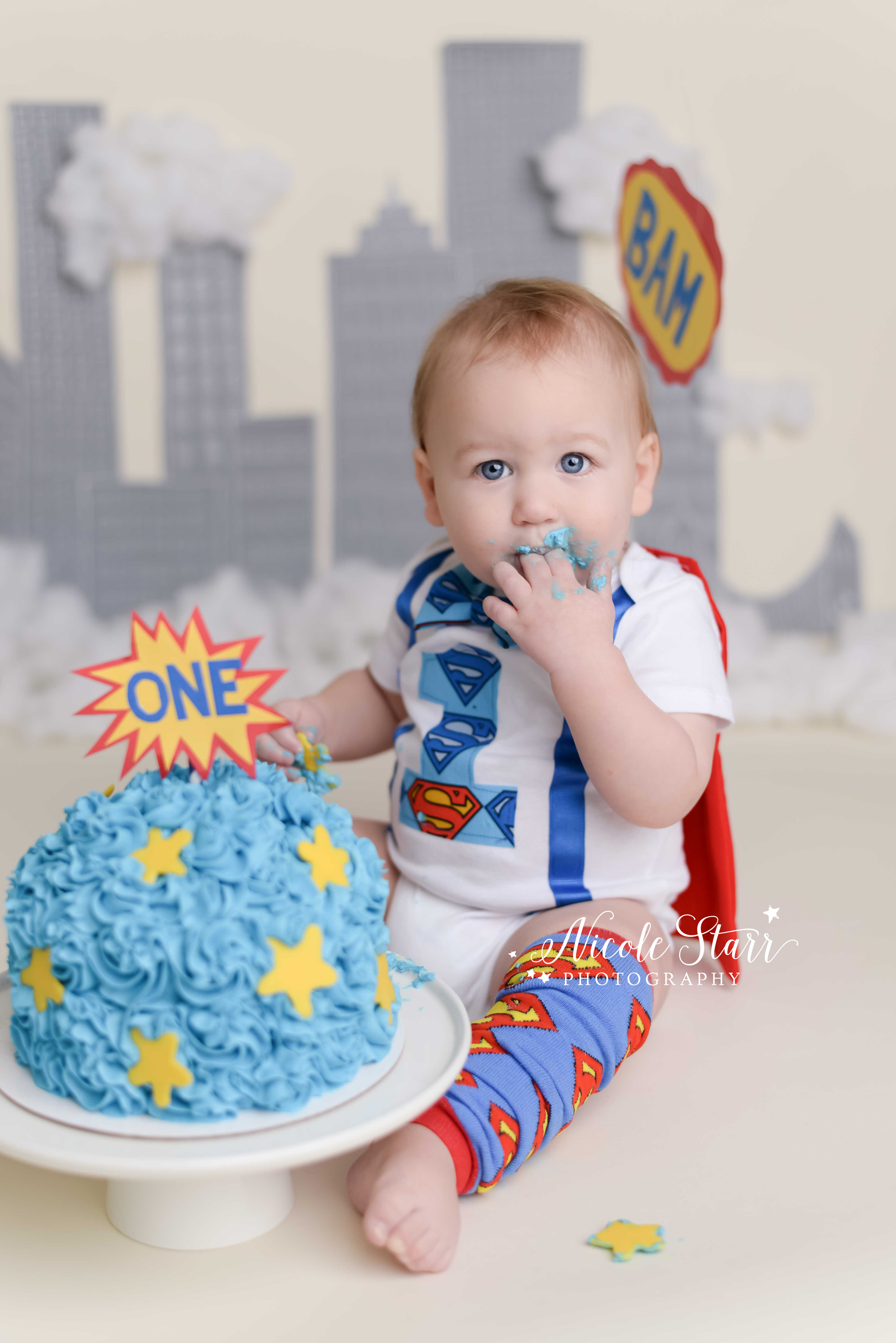 superhero baby first birthday cake smash.jpg