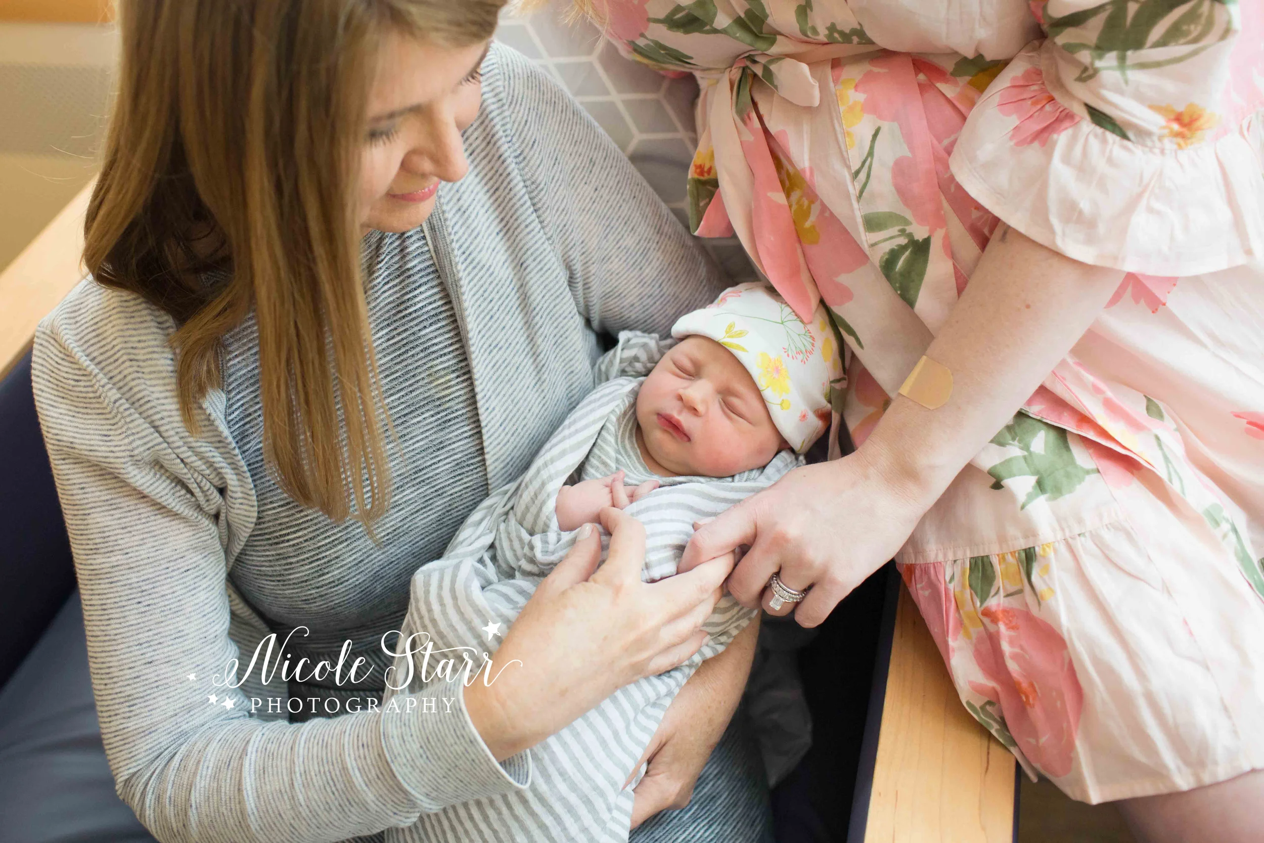 newborn photo with hands and three generations