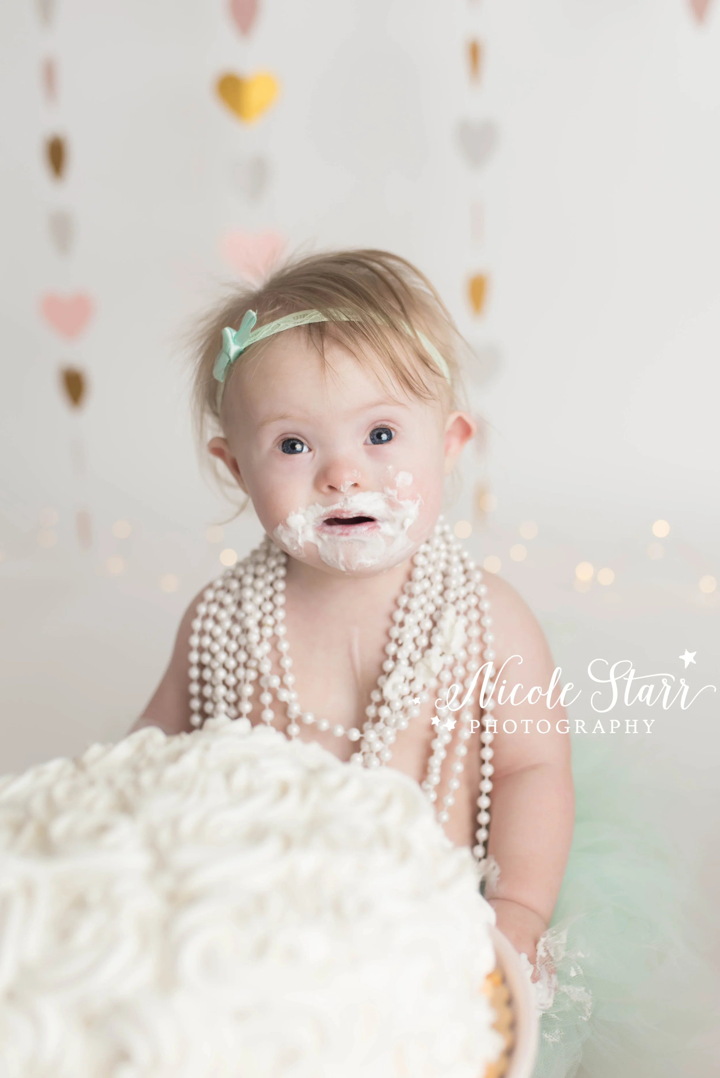 Nicole Starr Photography | Saratoga Springs Cake Smash Photographer | Boston Cake Smash Photographer | Down Syndrome Photographer | Down Syndrome Awareness