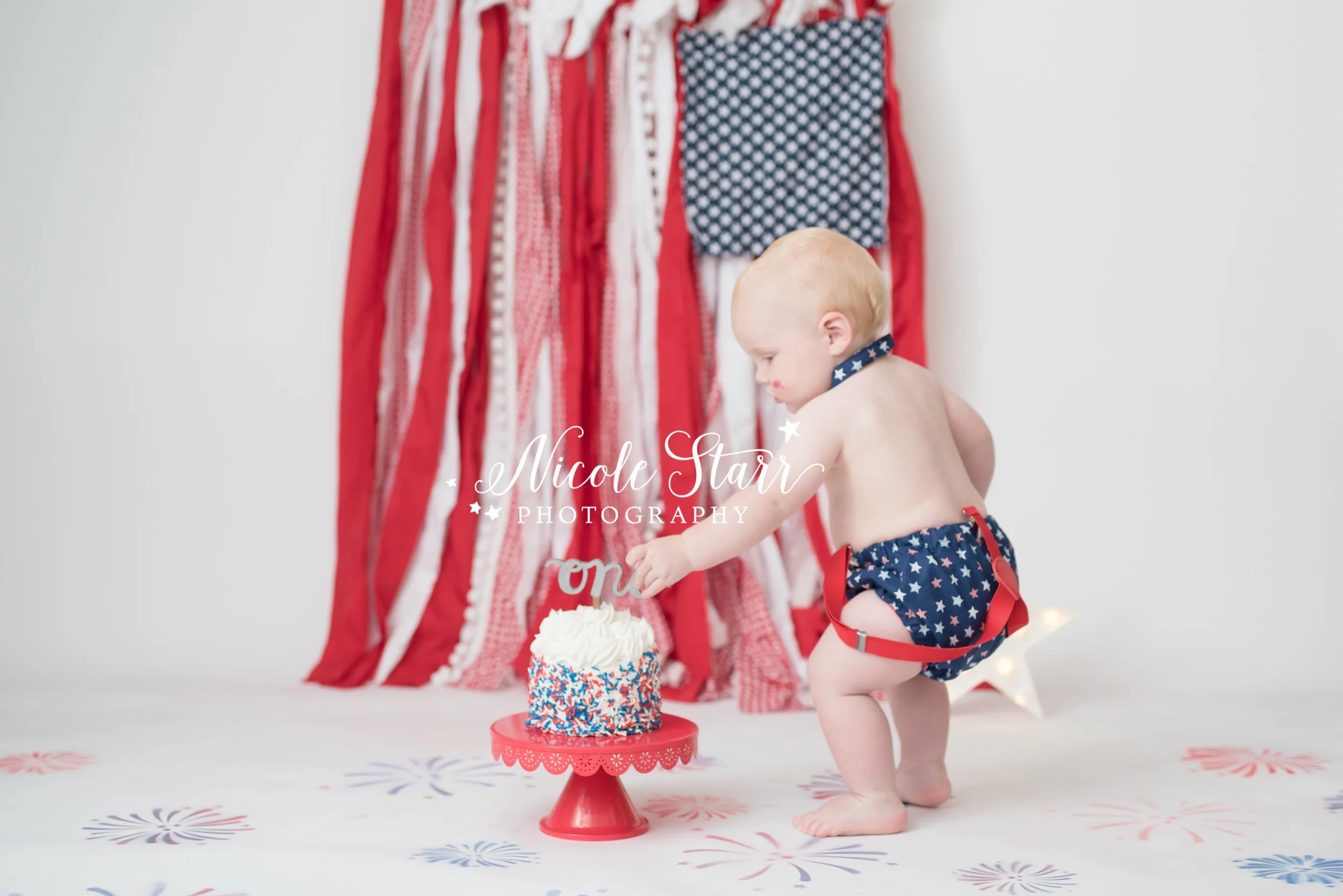 A Red White And Blue Firework Cake Smash For A 4th Of July Baby Saratoga Springs Baby Photographer Nicole Starr Photography