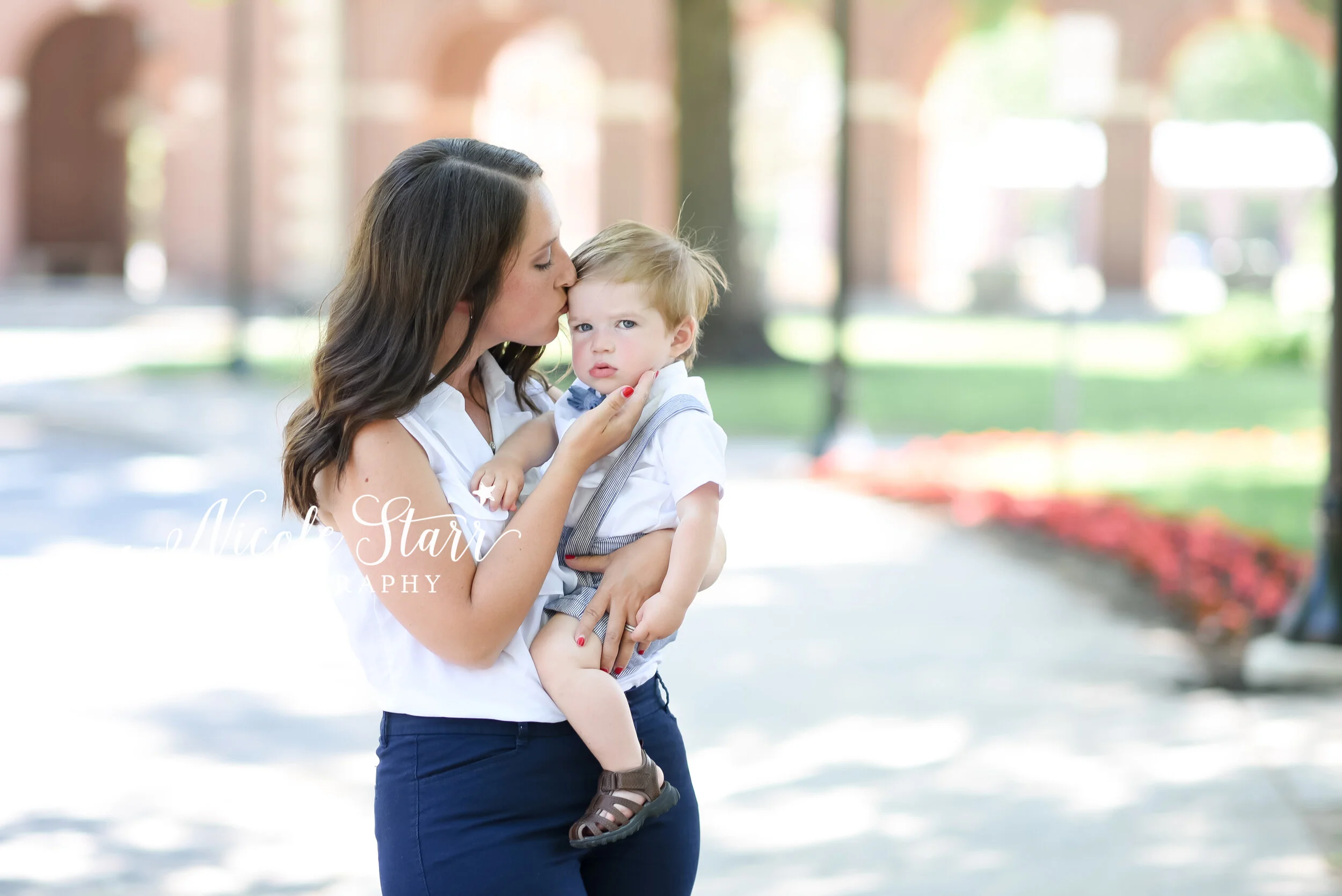 mom holds toddler son for family photos photographed by Nicole Starr Photography, New York cake smash photographer | Delmar NY cake smash, Loudonville NY cake smash, Albany NY Cake smash