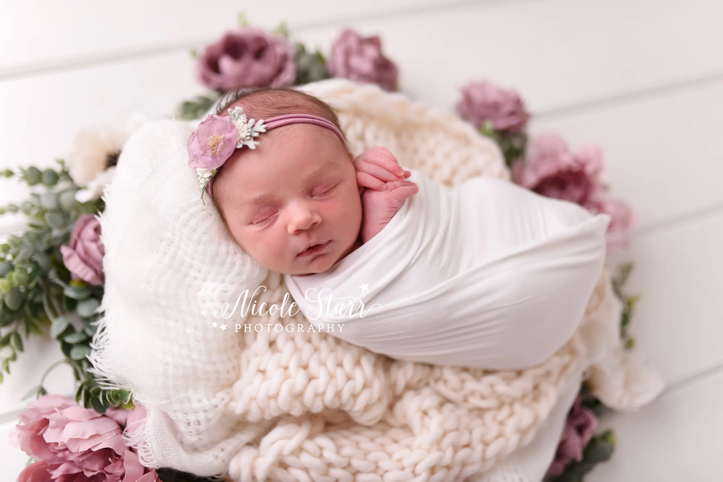 newborn session with mauve flower details photographed by Nicole Starr Photography, Albany NY newborn photographer | Delmar NY newborn photographer, Loudonville NY newborn photographer, Clifton Falls NY newborn photographer
