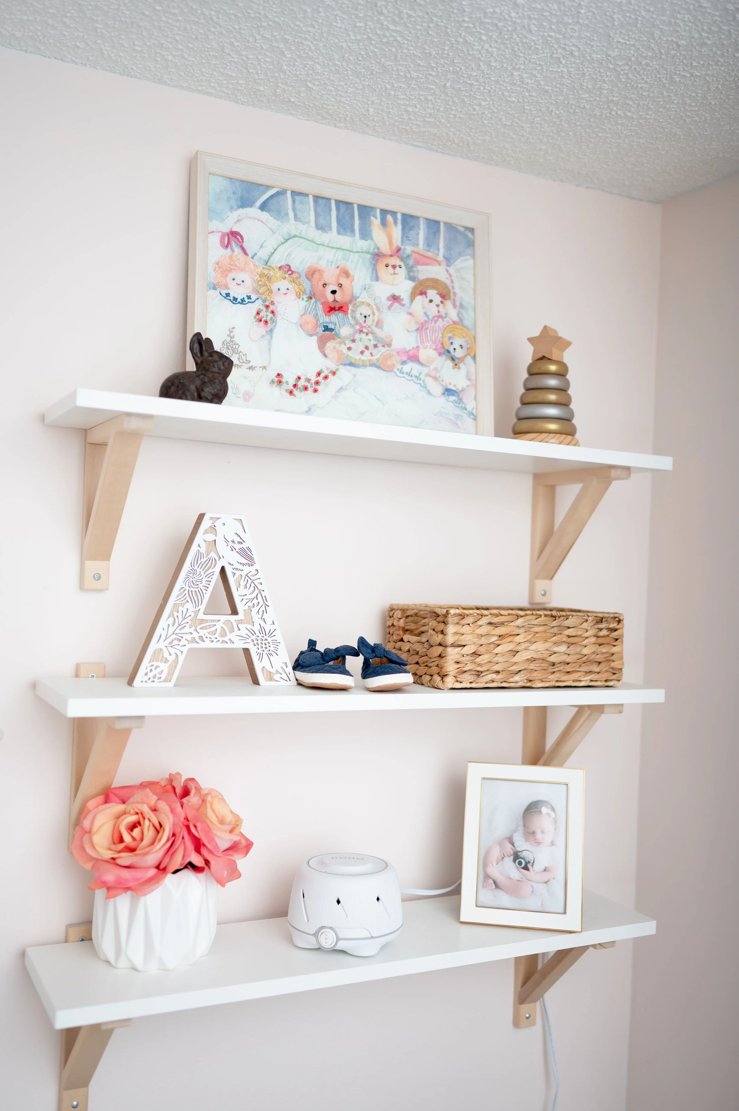 Baby girl nursery with Sherwin Williams Intimate White | blush and blue nursery | Saratoga Springs newborn photographer Nicole Starr Photography