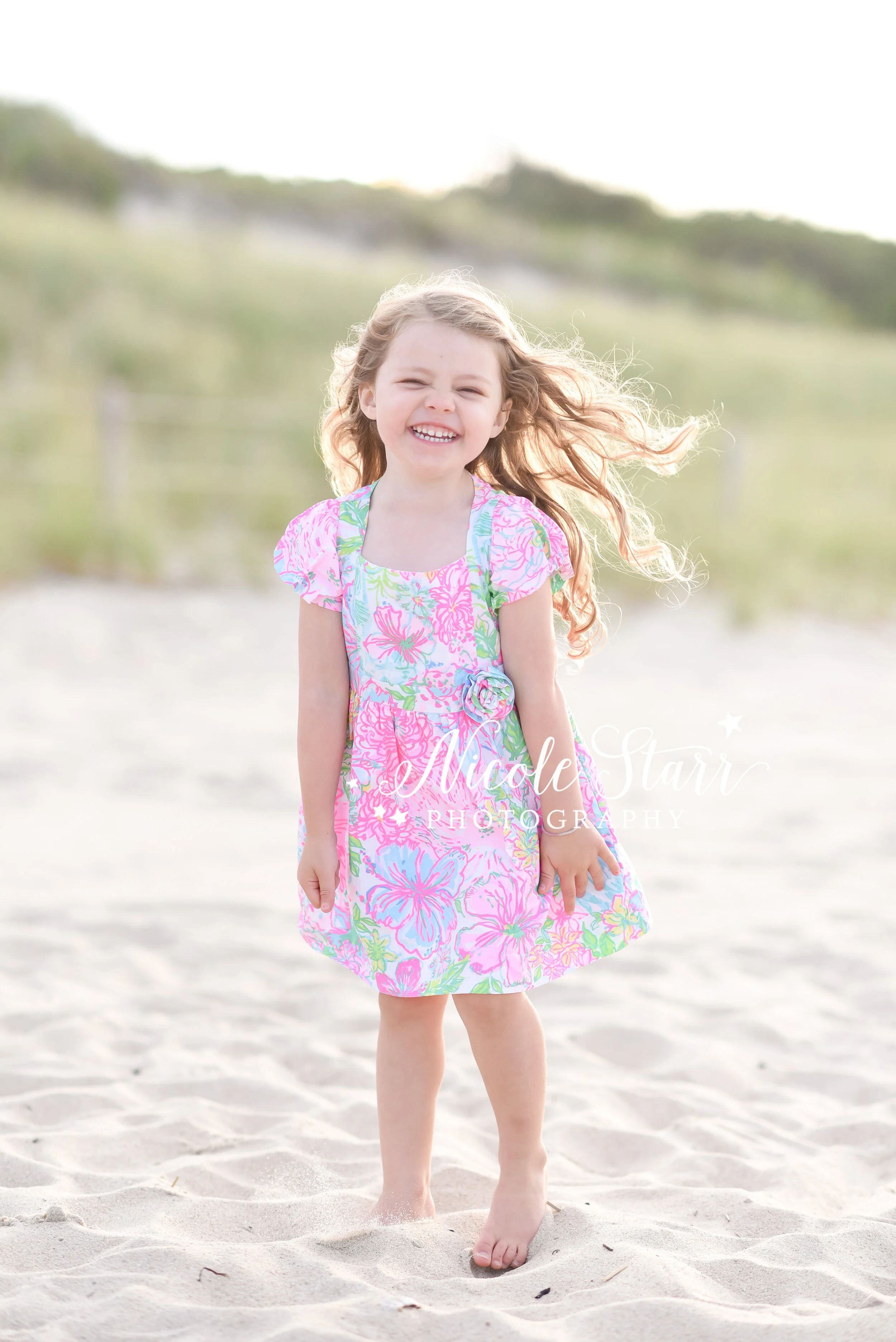 little girl stands in Lily Pulitzer dress in Dennis photographed by Cape Cod family photographer Nicole Starr Photography