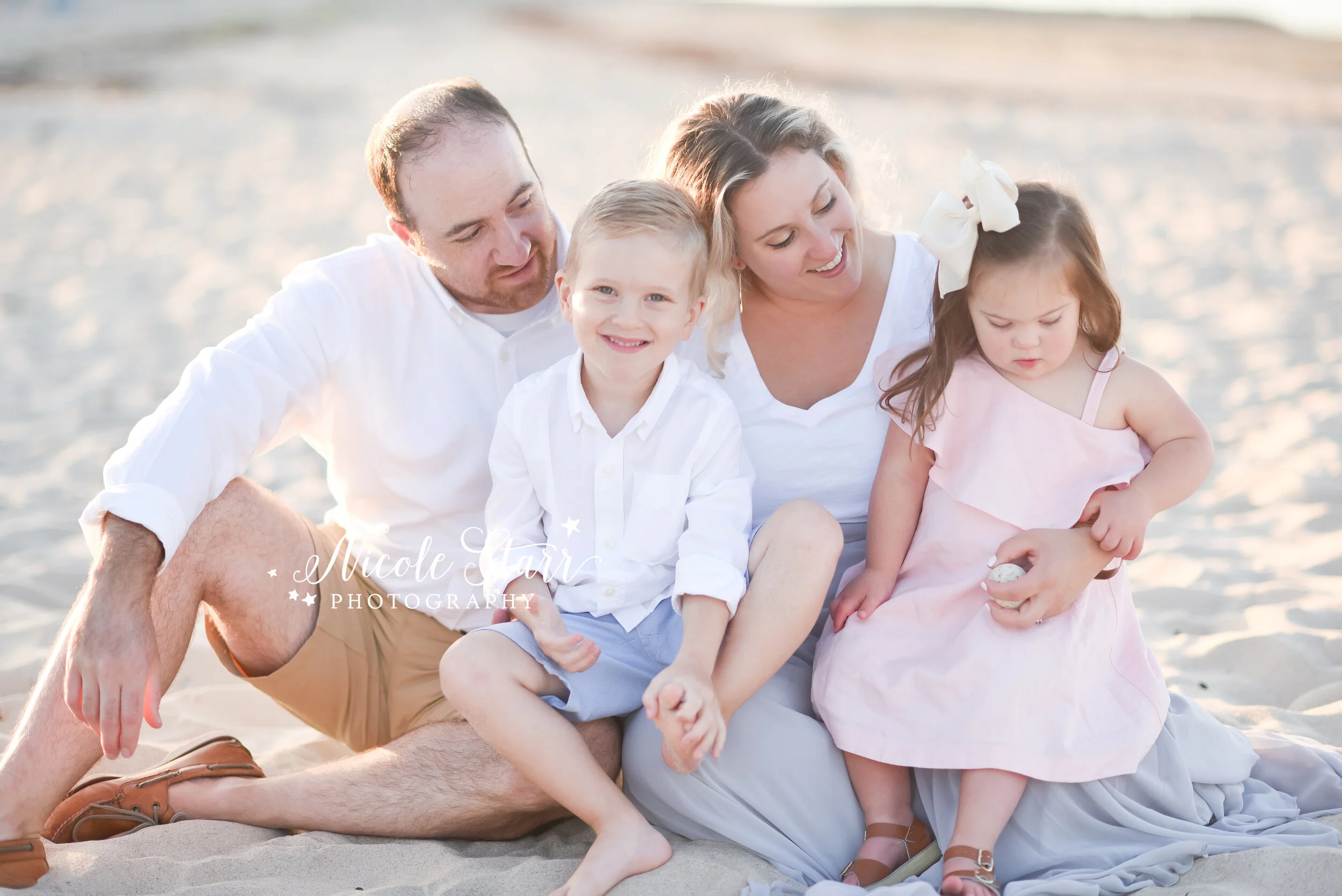 Luxury family photographer Nicole Starr Photography reminds parents to get in the photos and schedule their next family portrait session