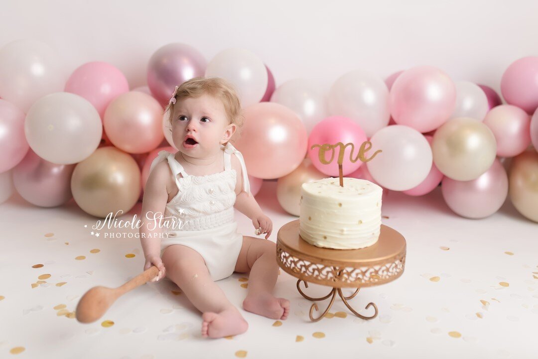 The prettiest pink &amp; gold cake smash for little miss Brooke!  She even borrowed a cute little romper from the studio's Baby Wardrobe, and it was absolutely perfect on this sweet birthday girl! ⠀⠀⠀⠀⠀⠀⠀⠀⠀
.⠀⠀⠀⠀⠀⠀⠀⠀⠀
.⠀⠀⠀⠀⠀⠀⠀⠀⠀
.⠀⠀⠀⠀⠀⠀⠀⠀⠀
.⠀⠀⠀⠀⠀⠀⠀⠀⠀