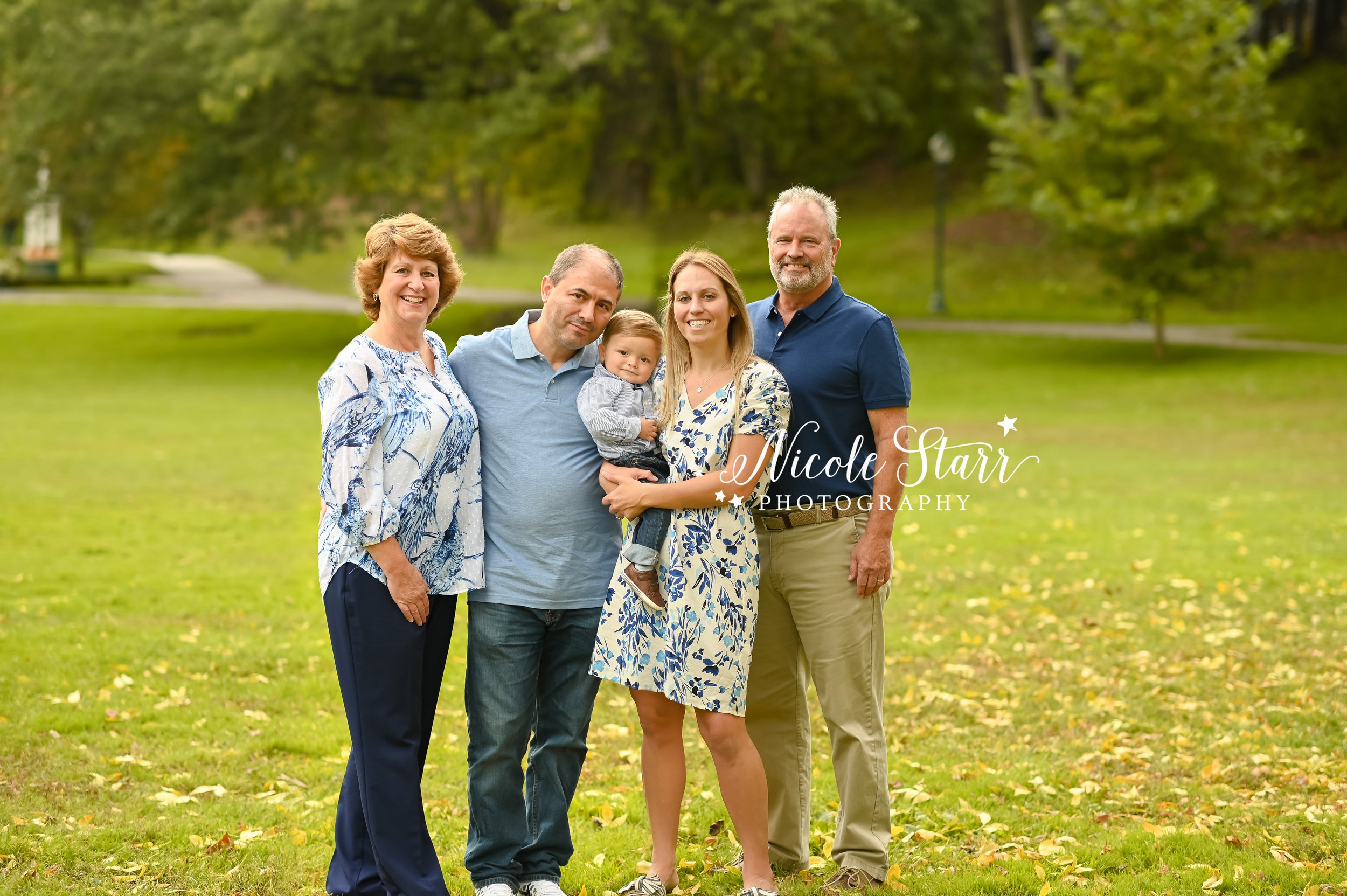 family poses with toddler during Saratoga Springs family photos