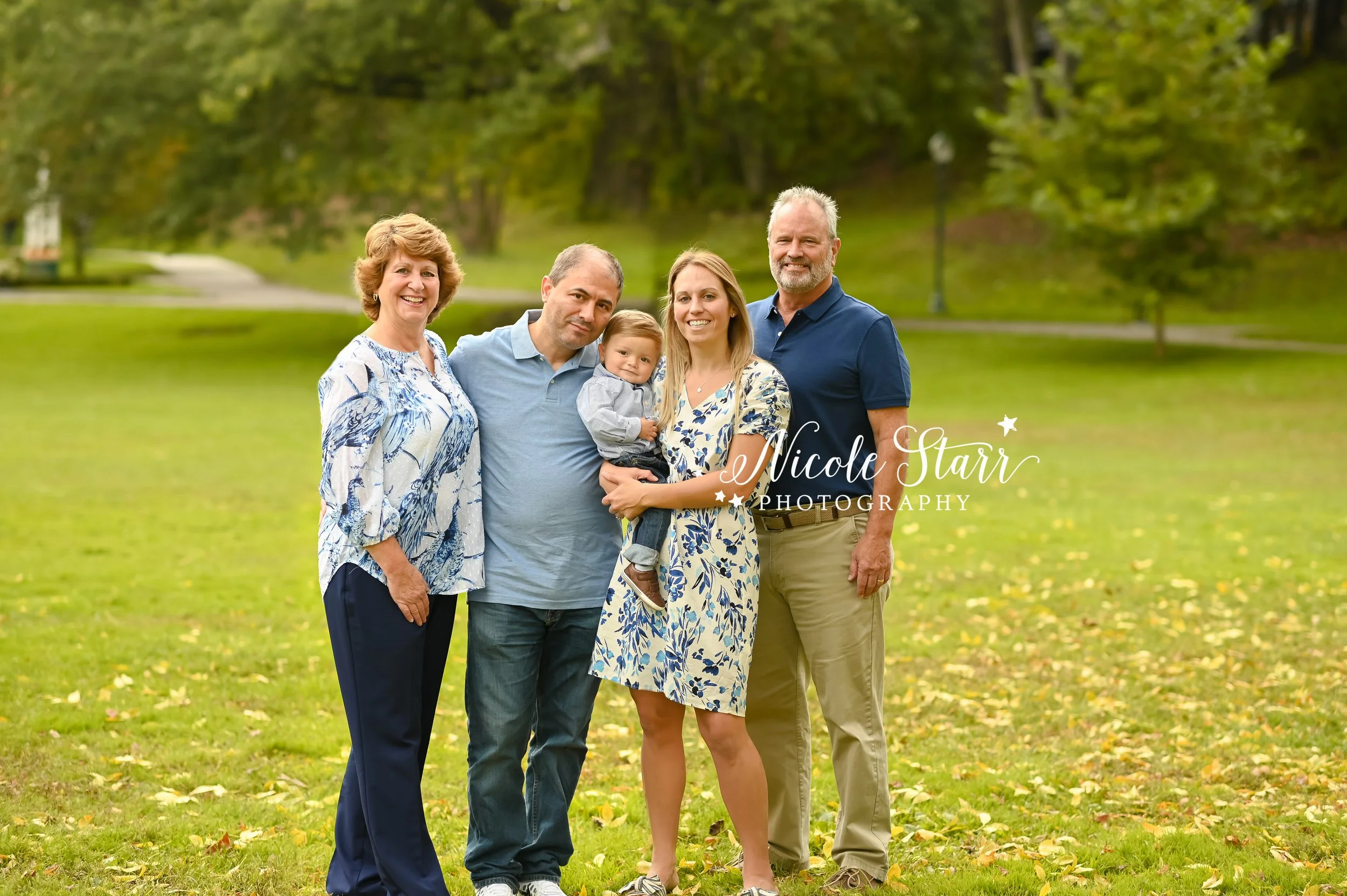 family poses with toddler during Saratoga Springs family photos