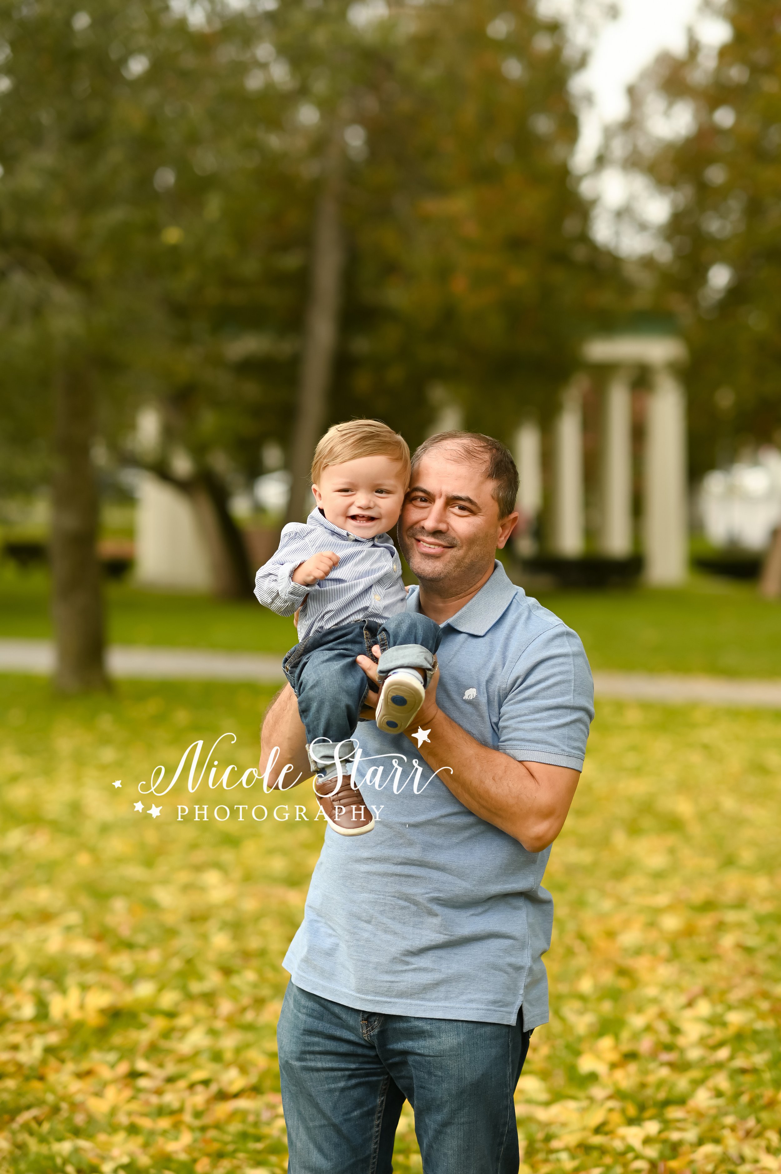 dad hugs son during family photos with Saratoga Springs family photographer Nicole Starr Photography