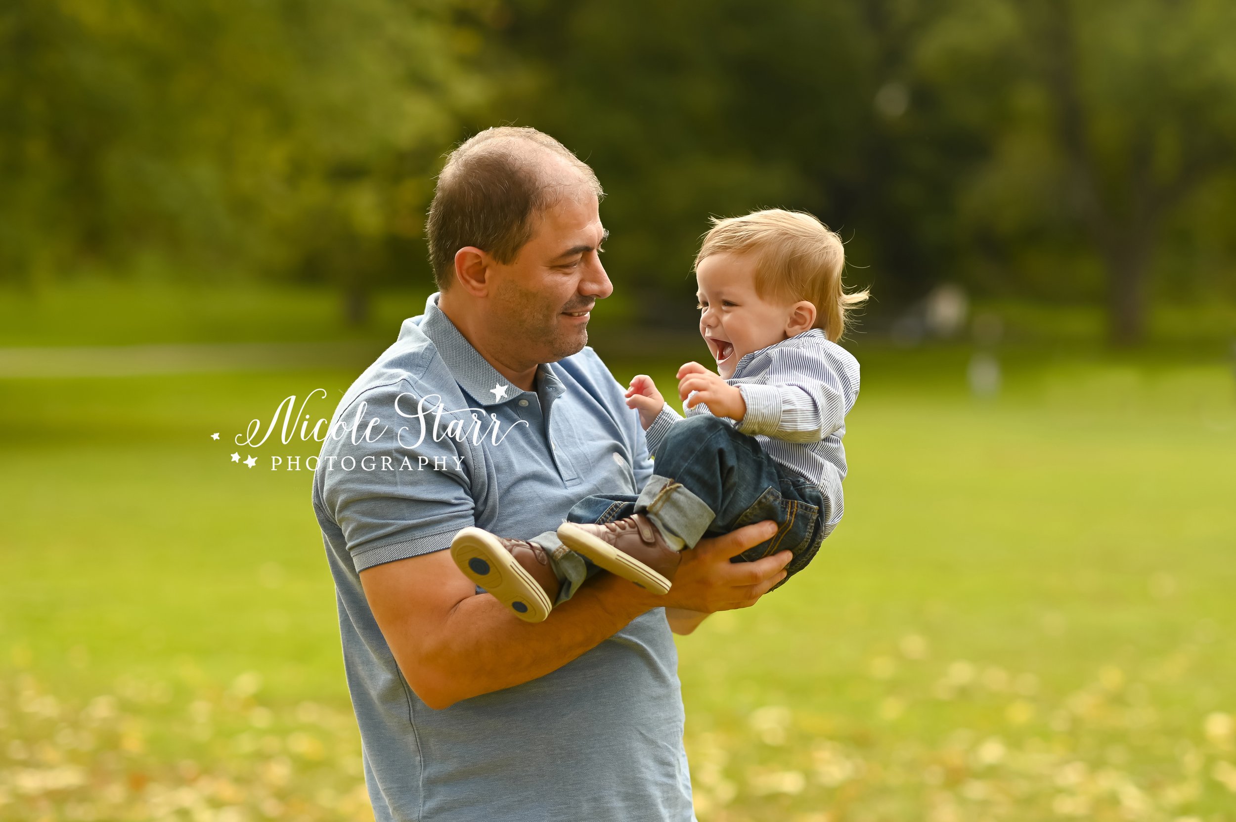 dad and toddler play in park with Saratoga Springs family photographer Nicole Starr Photography