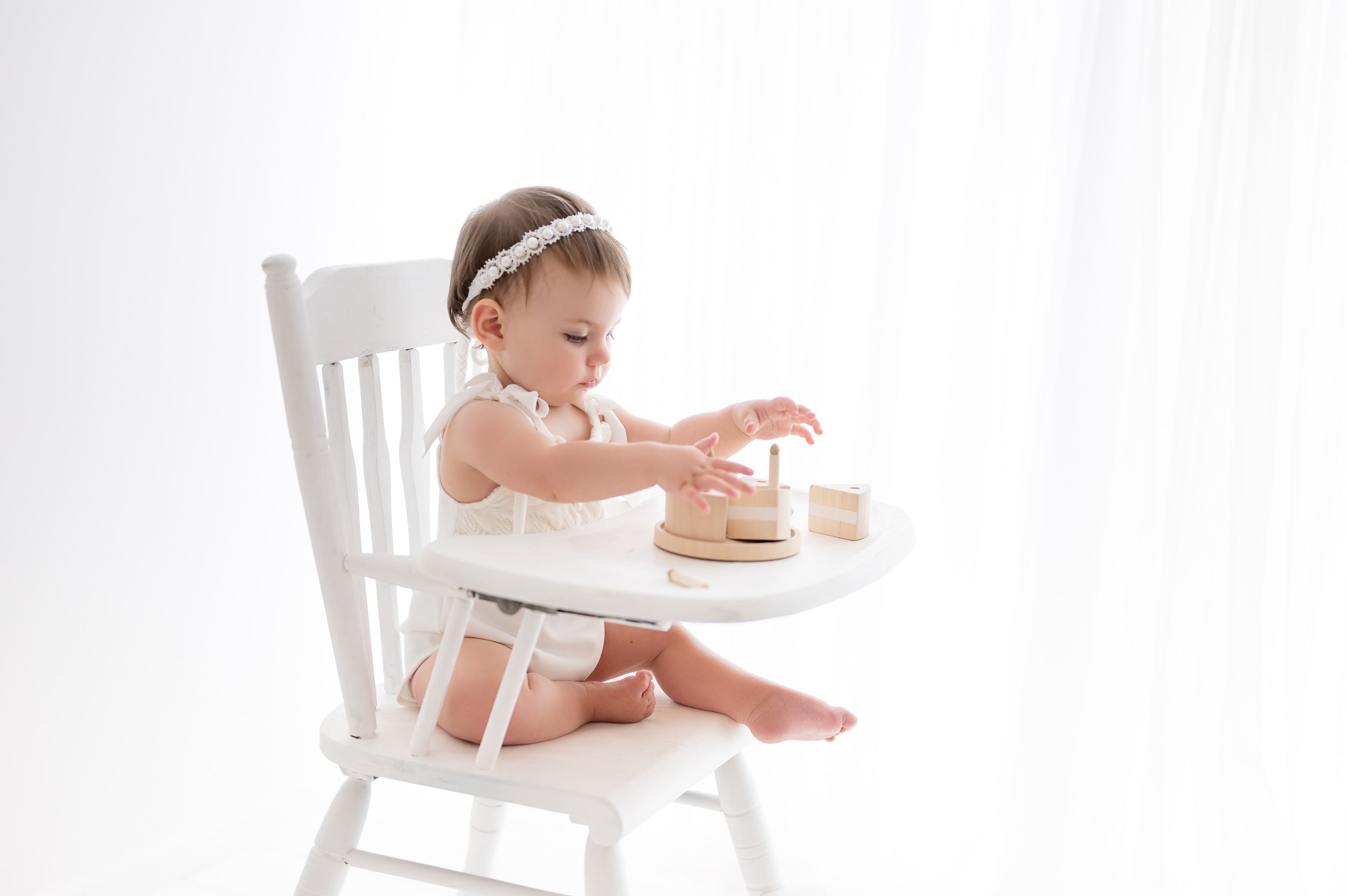 05-17-2023 white high chair with wooden cake-7.jpg