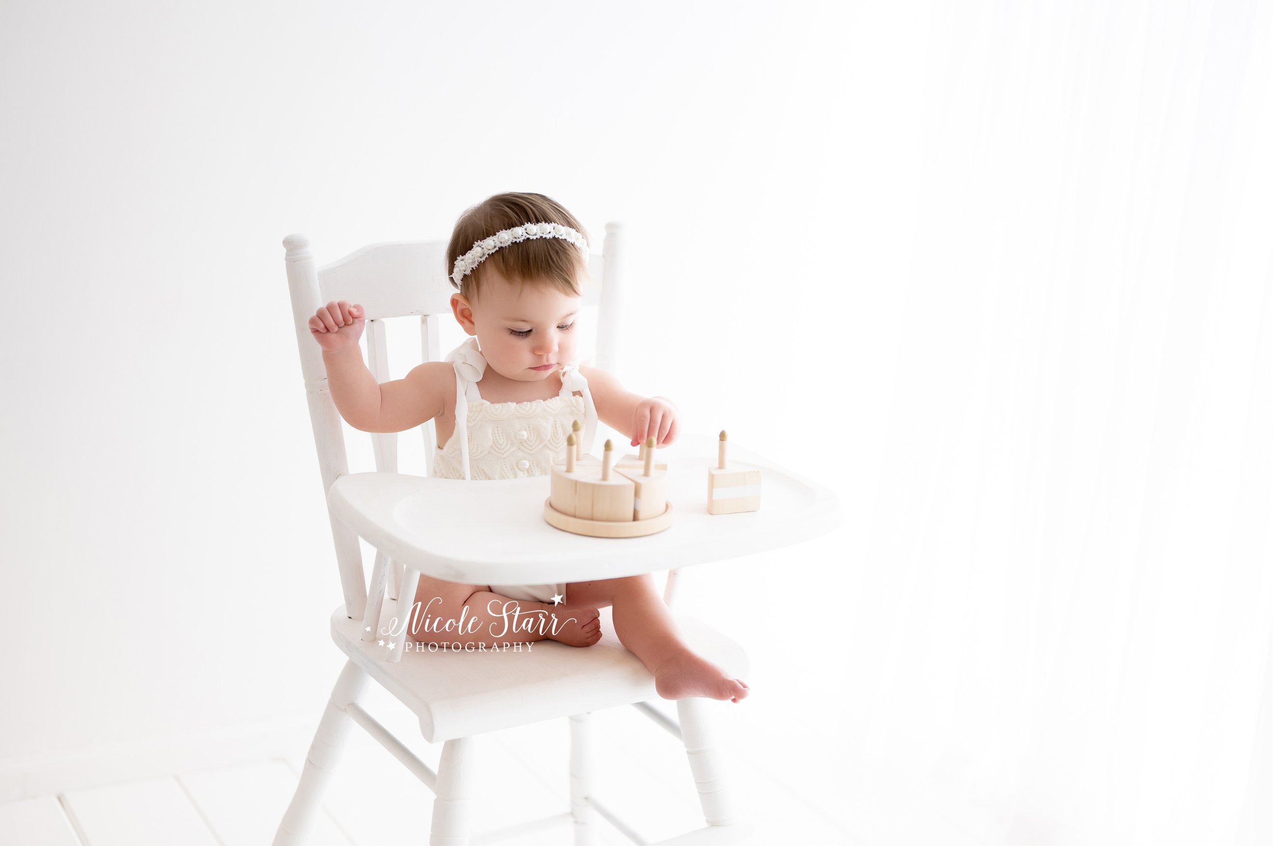 05-17-2023 white high chair with wooden cake-2.jpg