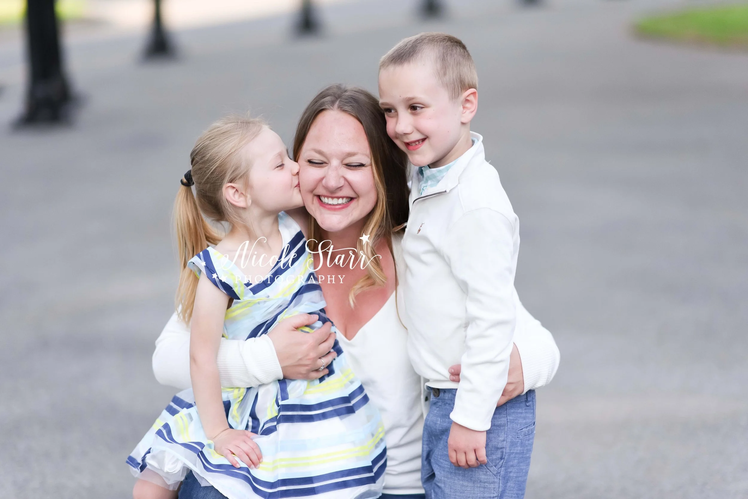 two kids hug mom during spring family photos in Saratoga Springs with Nicole Starr Photography, NY family photographer
