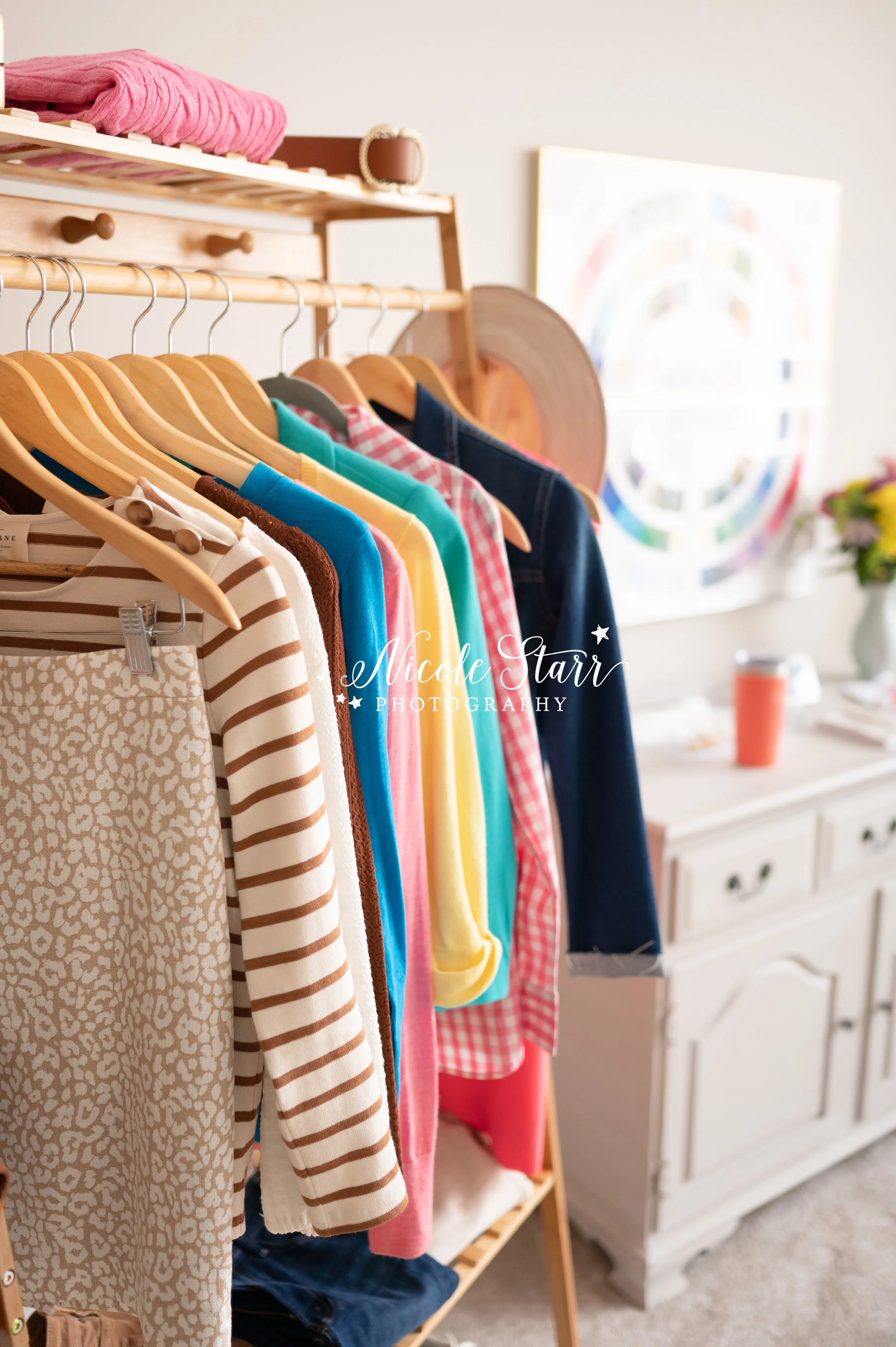 clothes hang in closet during branding session for color consultant photographed by Saratoga Springs NY branding photographer Nicole Starr Photography