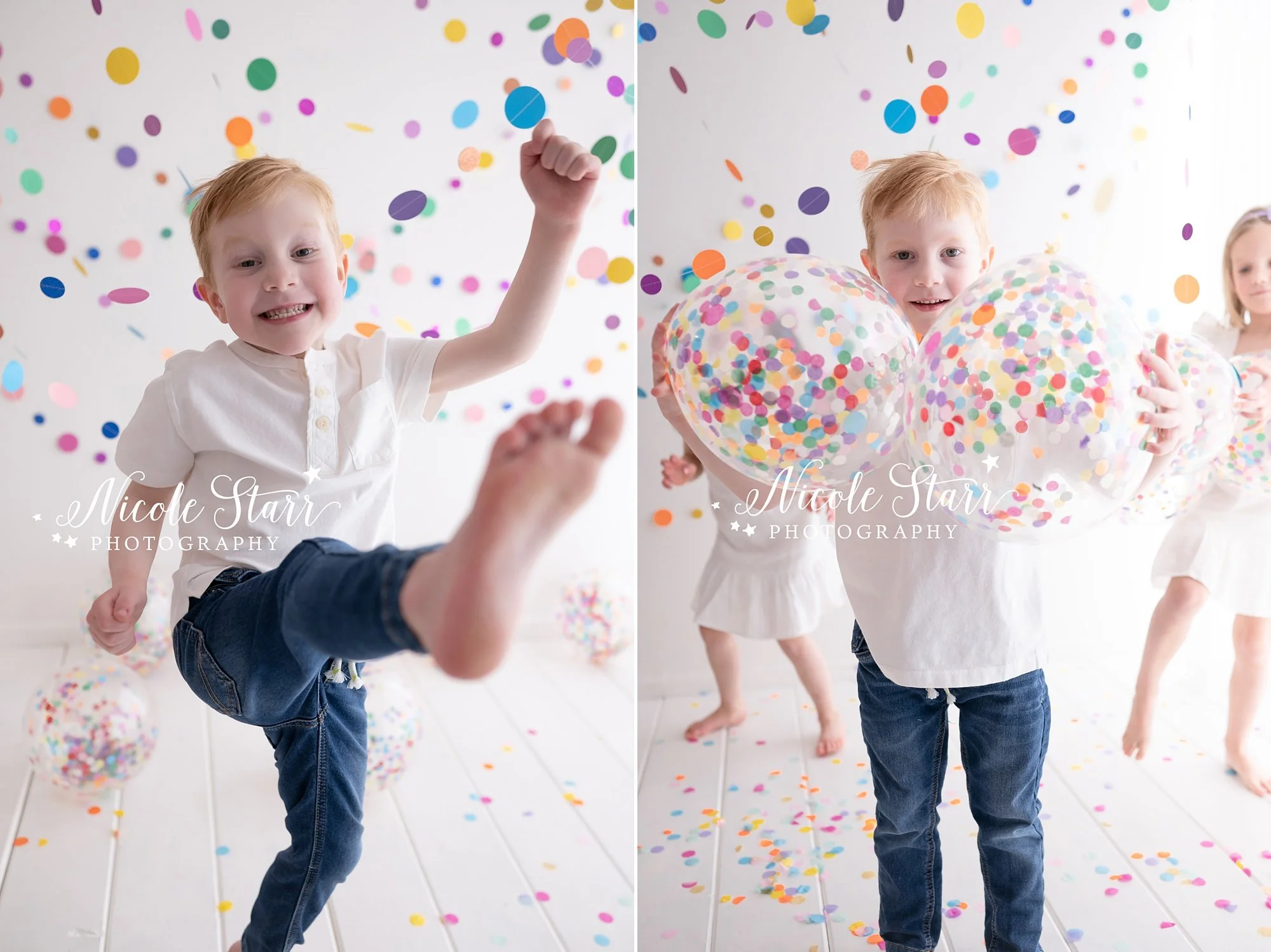 fine year old boy in white shirt and jeans dances with confetti beach balls in front of rainbow streamers for cake smash with Nicole Starr Photography, Saratoga Springs children’s photographer