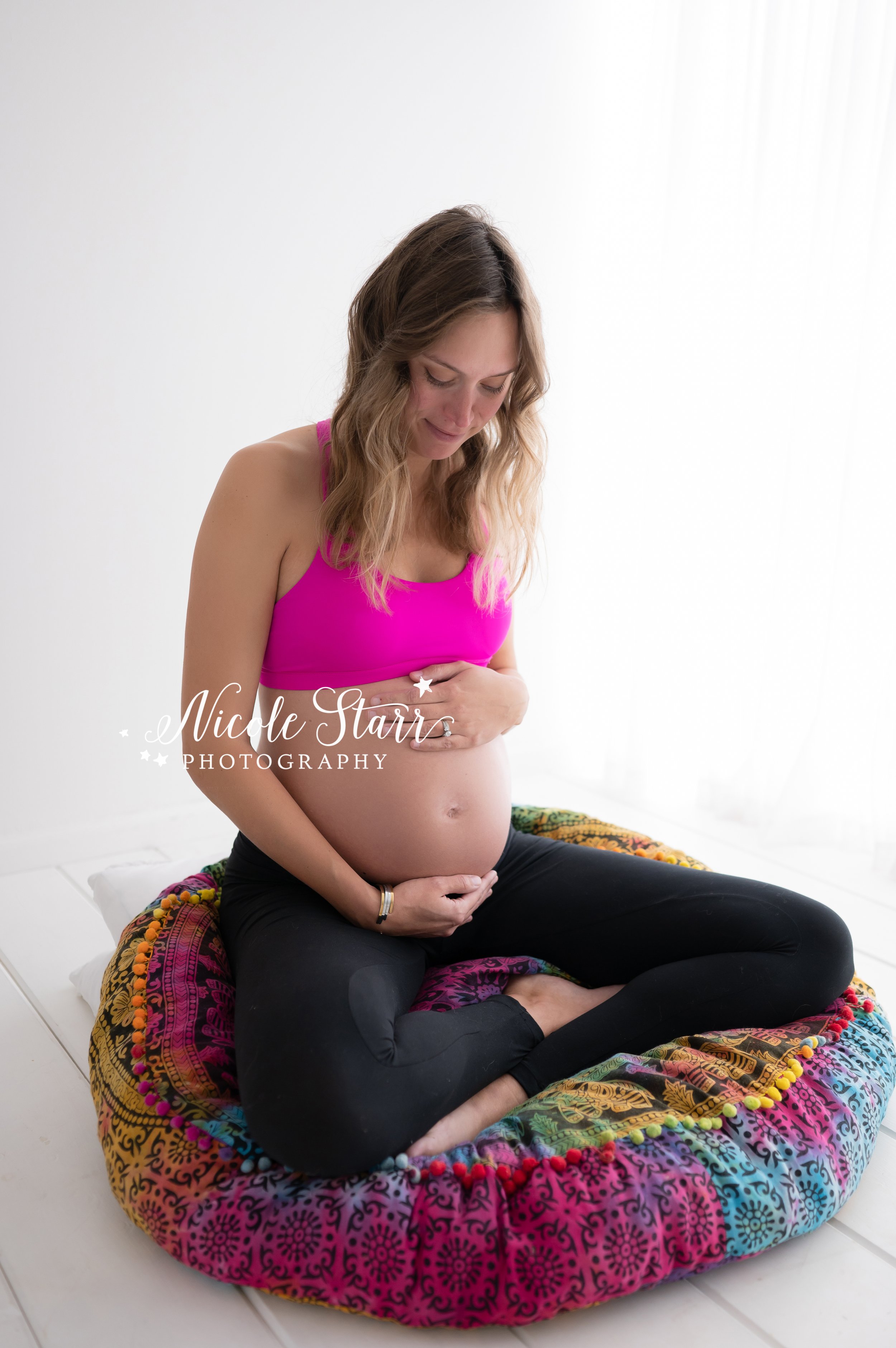 Young pregnant woman doing yoga meditation on the beach - Maternity and  healthy lifestyle concept Stock Photo by SabrinaBracher