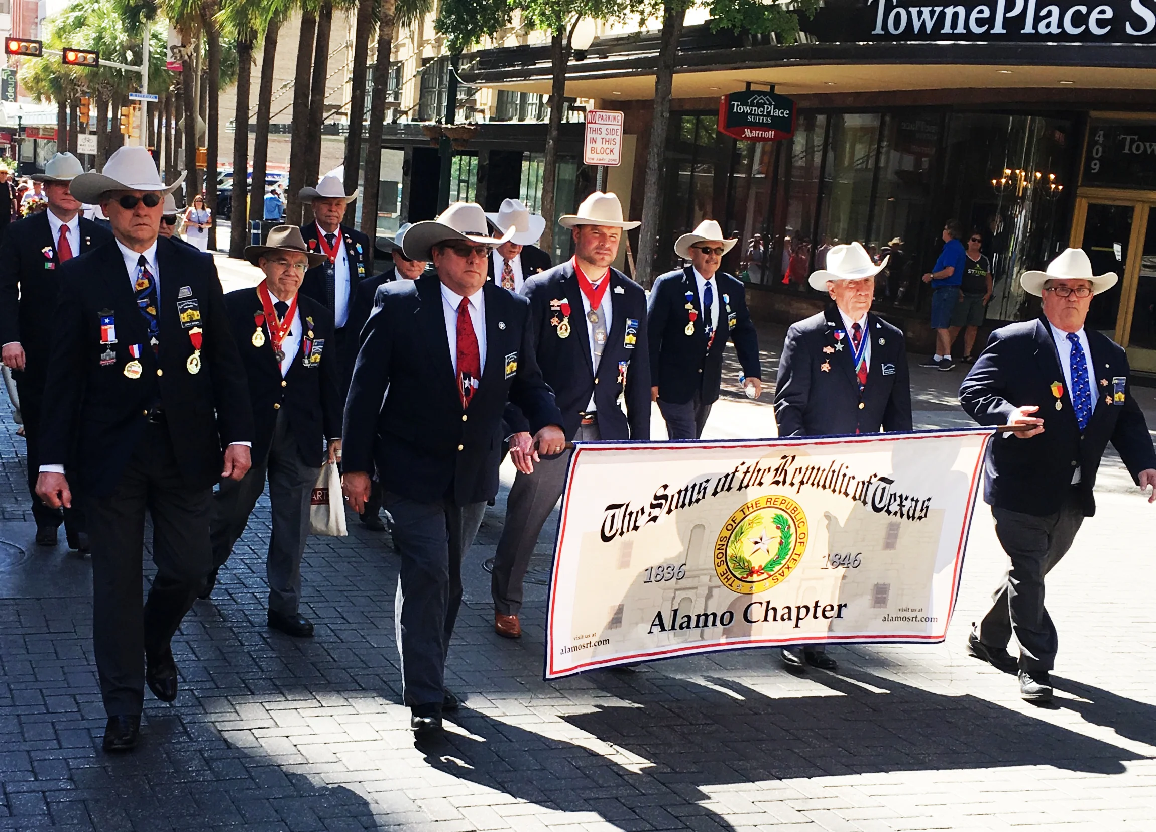 Every year since 1925, the Alamo Mission Chapter of the Daughters for the Republic of Texas (DRT) has staged the annual Pilgrimage to the Alamo & The Sons Of The Republic of Texas, Alamo Chapter was there to show its support. This is a memorial tribute to the Alamo Heroes and the heritage of Texas. A solemn wreath bearing procession of historic, civic, patriotic, military and school groups depart from the Vietnam Memorial at the Tobin Center, at 3:30 p.m., and walk silently to the Alamo. Simultaneously, an authoritative voice intones the names of the Alamo defenders from inside the Alamo walls. Following the procession and placing of the wreaths on the Alamo greensward, a brief memorial service takes place. The Fiesta Military Coordinator delivers the address and the sounding of Taps ends the ceremony. The Alamo Mission Chapter, DRT, founded in 1905, exists to provide and protect the history of Texas. The Chapter perpetuates the memory of the men and women who achieved and maintained Texas Independence, encourages historical research and preservation, and celebrates Texas Honor Days.