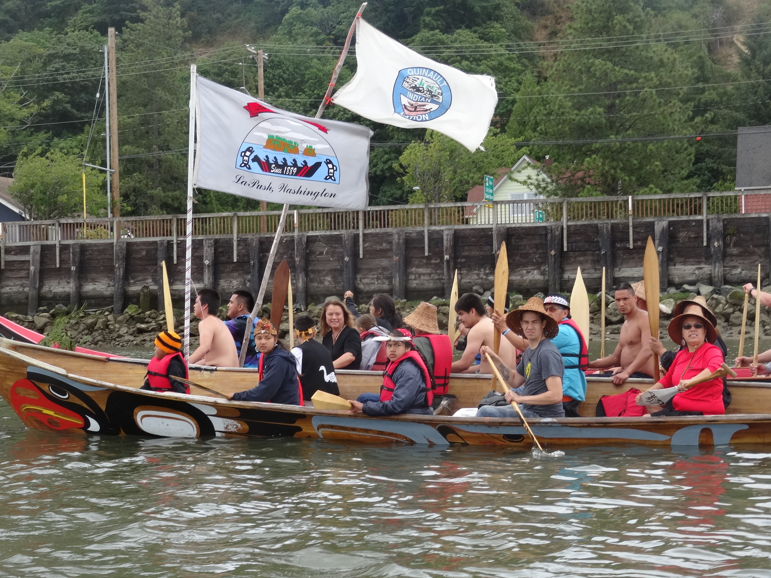 Quinault and Quileute canoes join in preparation for landing in Hoquiam for the "Shared Waters, Shared Values" rally on July 8, 2016 (Credit: Zoltan Grossman ).