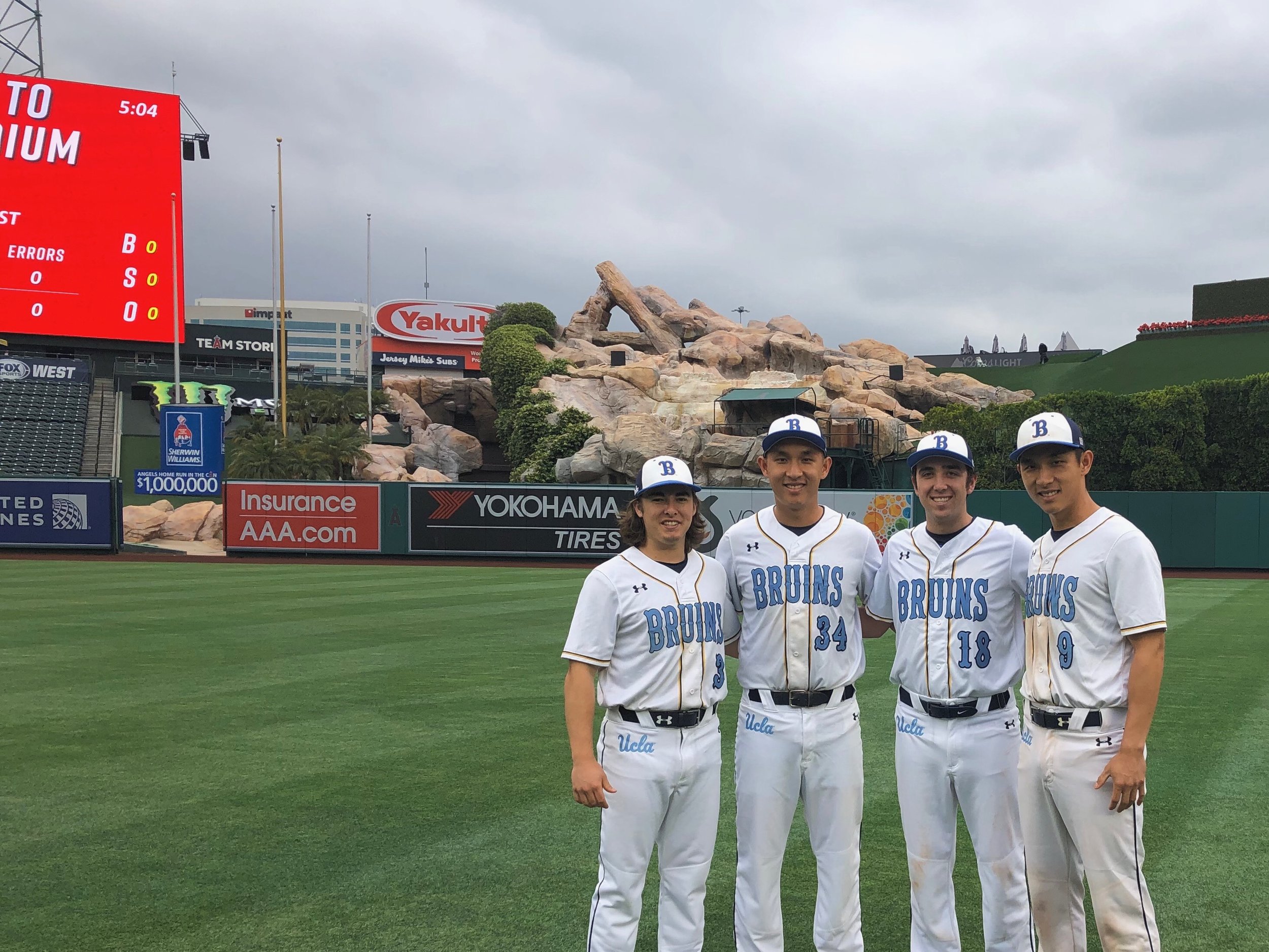   Brothers Mitch, Albert, Jake, and Lawrence playing at Angel Stadium  