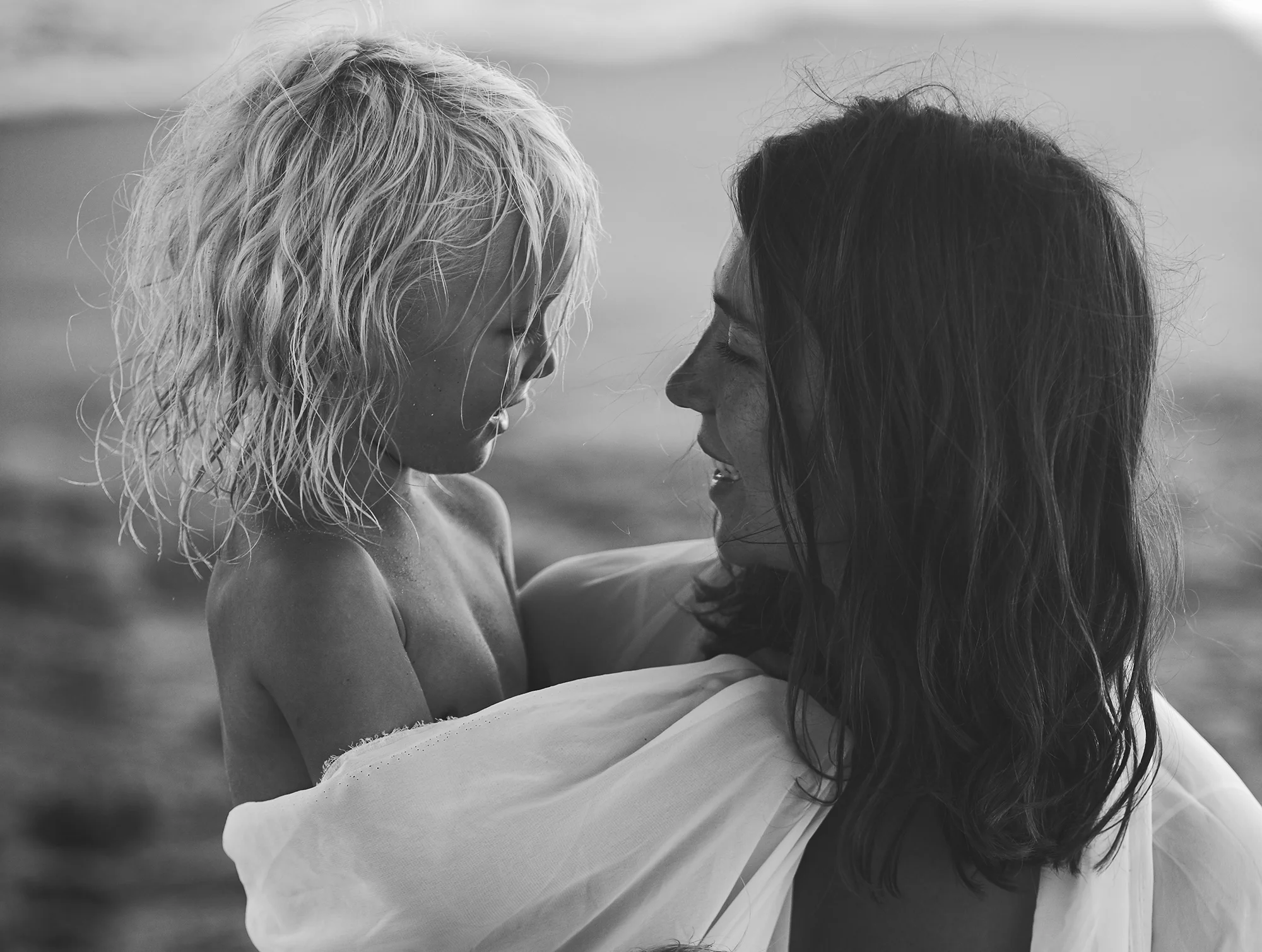 Mother with long haired blonde child in California