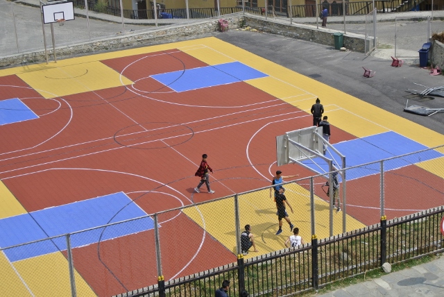 Thimphu - Kids playing basketball (640x428).jpg