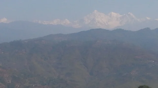 After a night of rainfall the snow-capped mountains appeared! 