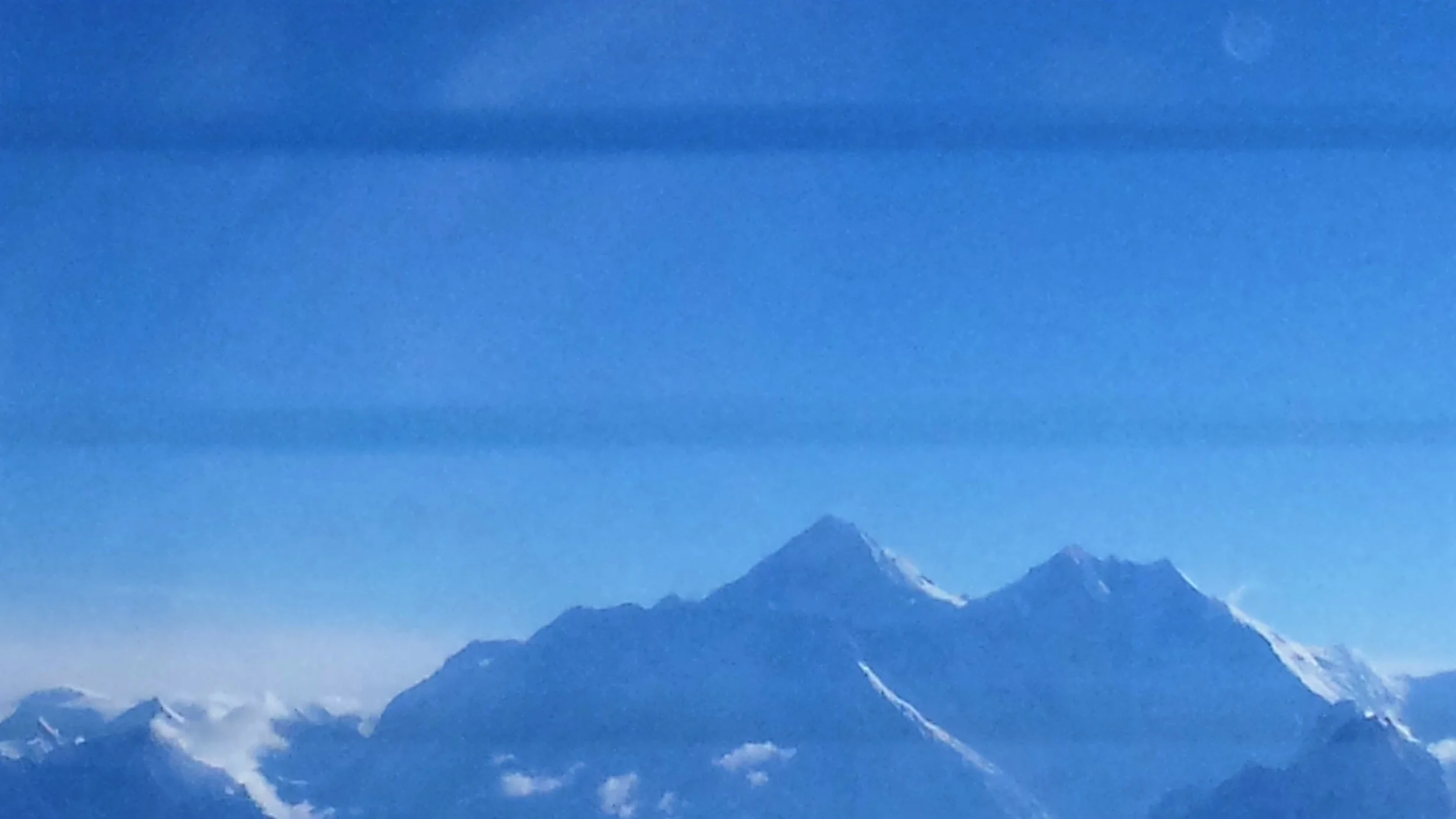 Everest is the peak on the left, unfortunately this is the best picture I could get - I was too busy enjoying the view from the cockpit!