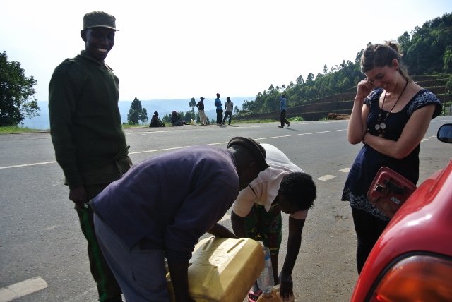Evariste (guy with the hat), a hitchhiker we picked up in Nyungwe who helped us negotiate with a local village for fuel.