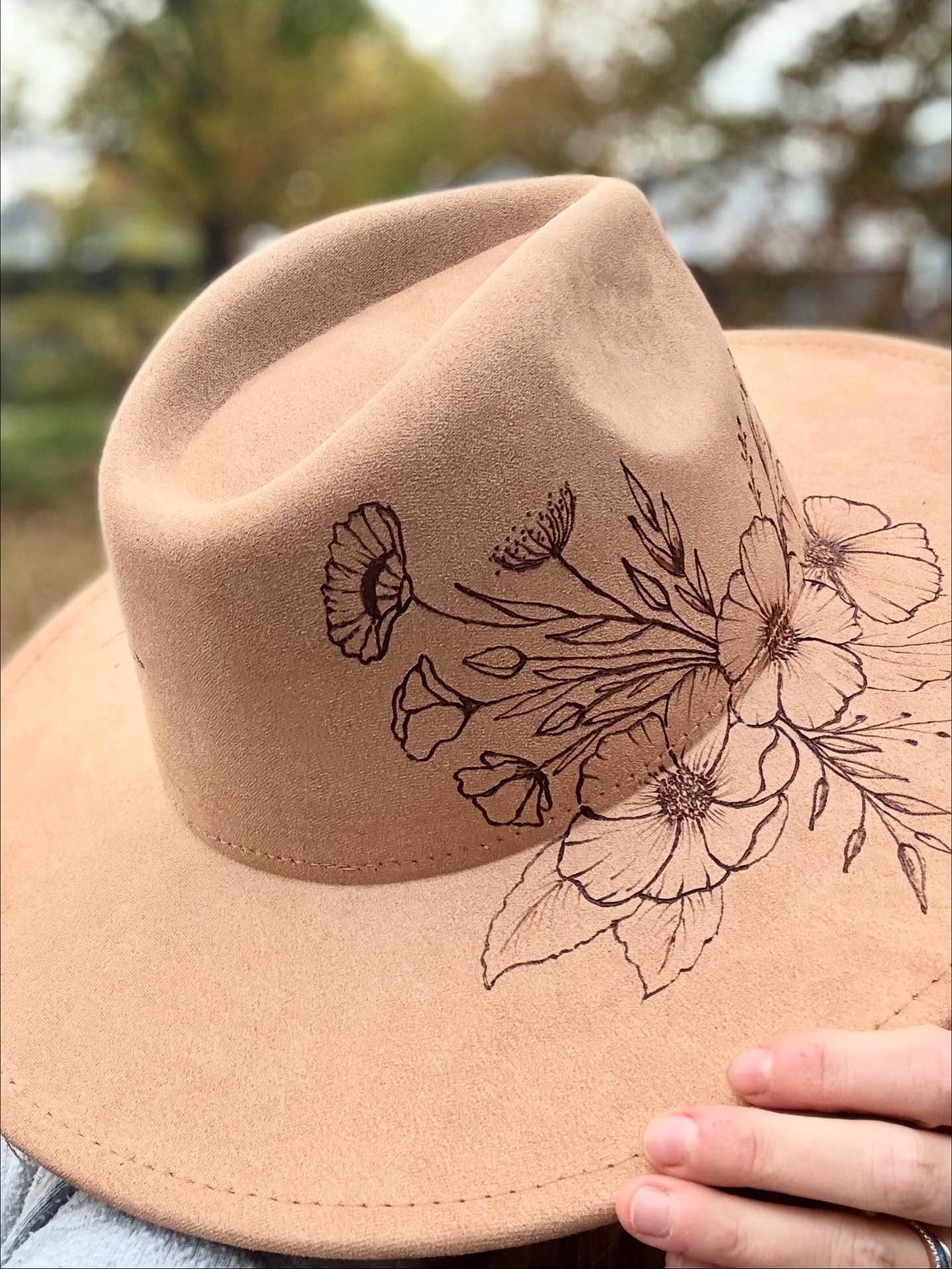 ✨Some new hats!👩&zwj;🌾✍️

I love wildflowers, and I have envisioned a design where a bouquet of wild flowers is wrapped around the hat. This was my aim for the first one here. 🥀🌷🌻🪻

I&rsquo;ll be setting up shop outside of @patrickmichaelaccess