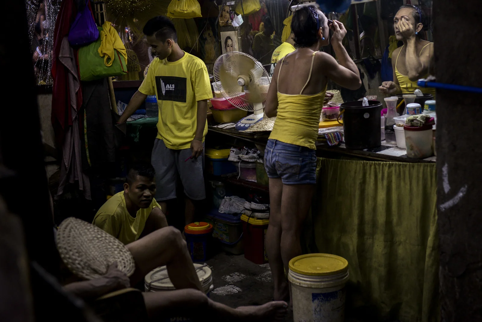 A transgender woman puts on makeup inside the Quezon City Jail.