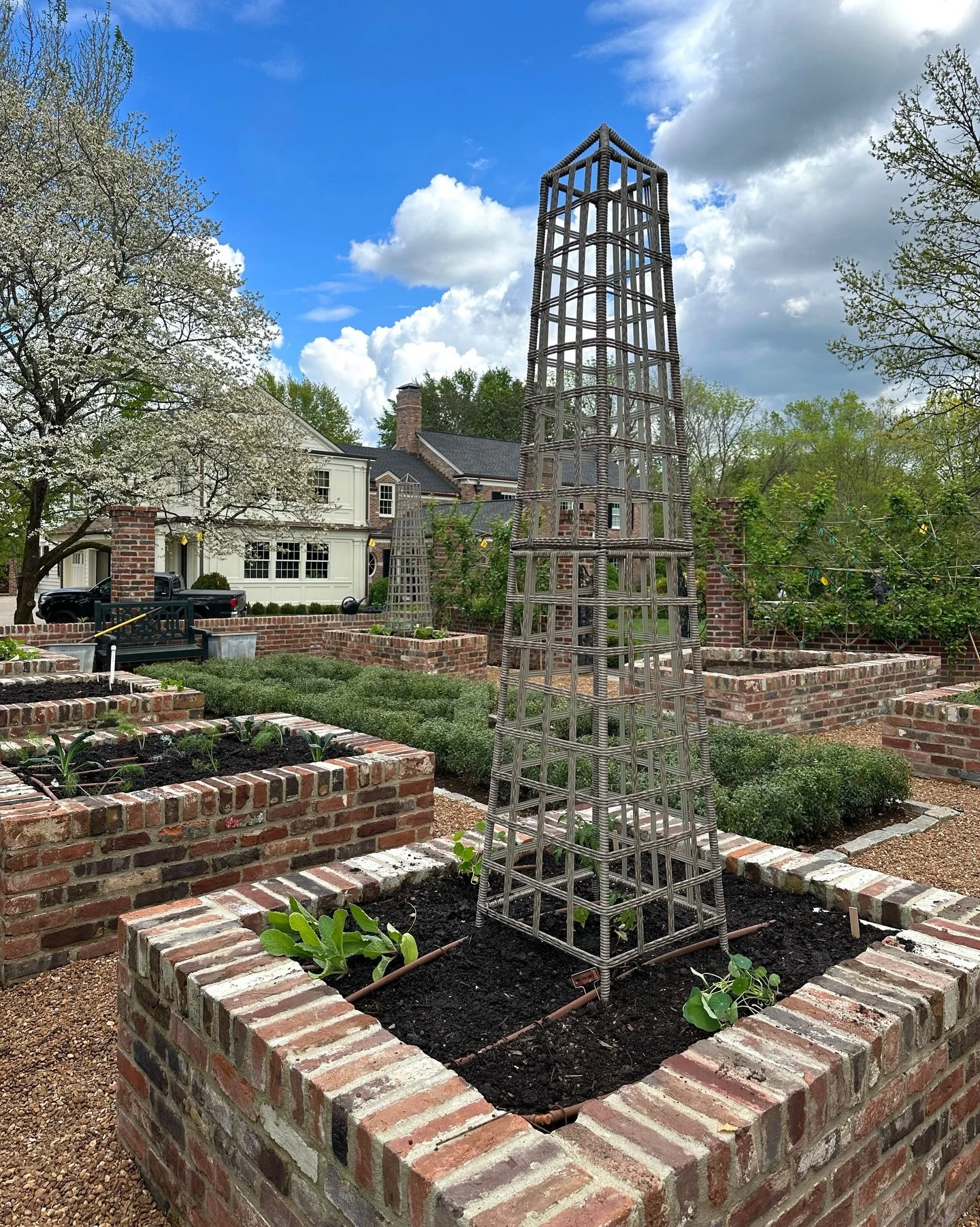Different vantage points of the same beautiful space in late winter, spring and early summer. #gardeninspiration #vegetablegarden #gardendesign #culinarygarden #raisedbedgarden