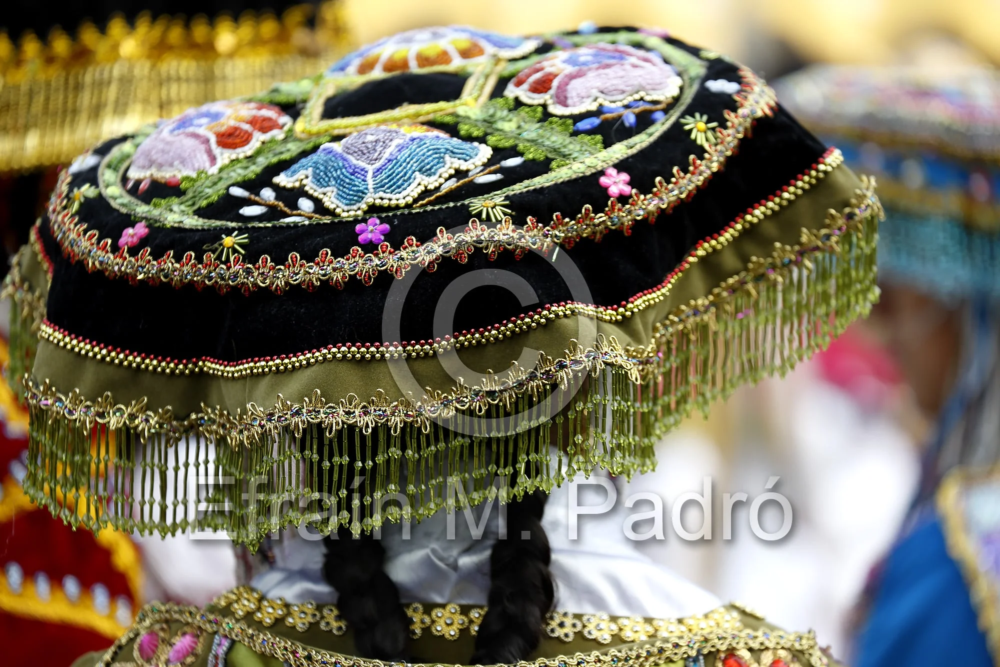 Hat of woman in costume celebrating feast of Virgen del Carmen de Paucartambo (Cusco Province), near Plaza de Armas, Lima, Peru