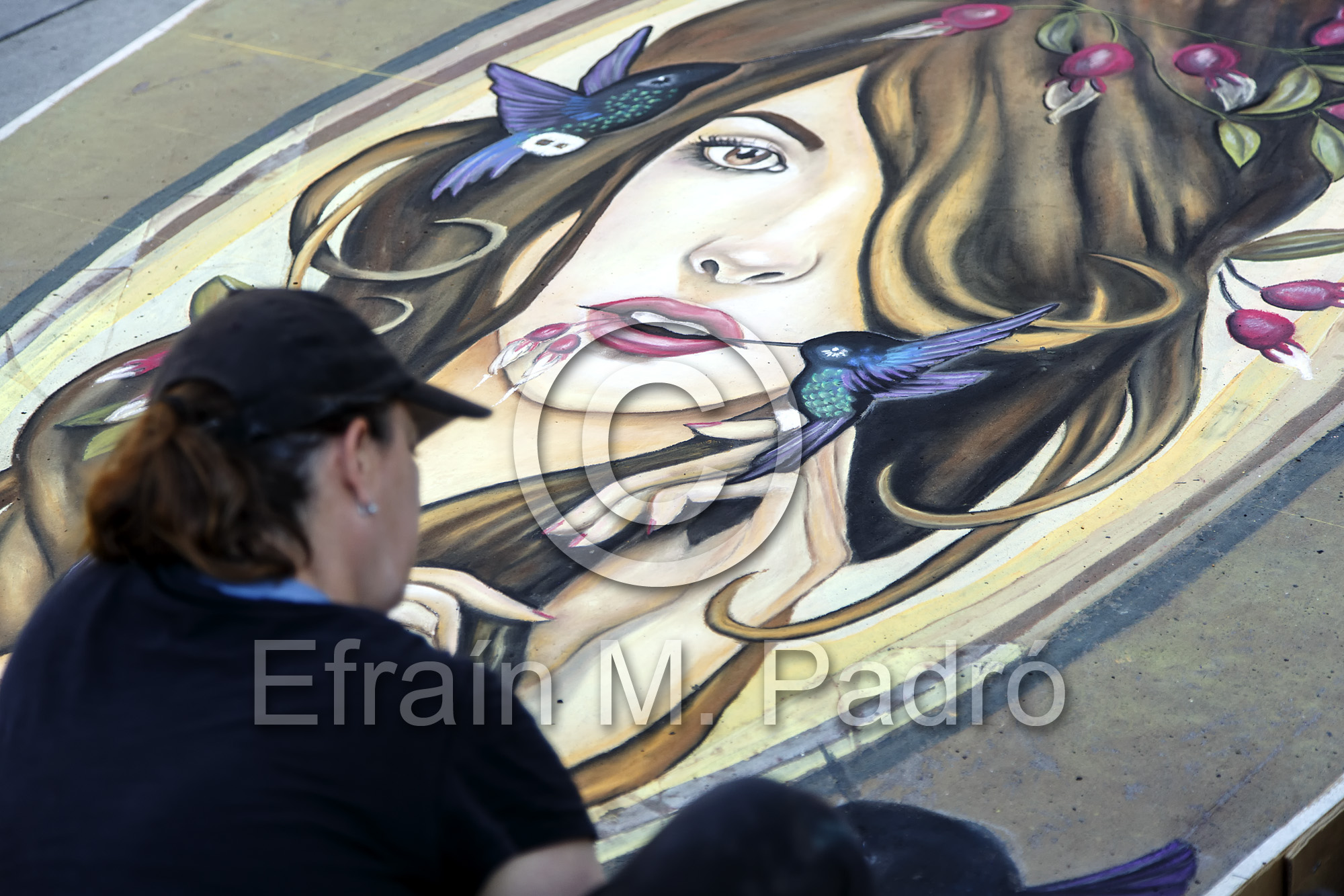 Artist working on chalk art piece, Chalk Art Festival, Larimer Square, Denver, Colorado