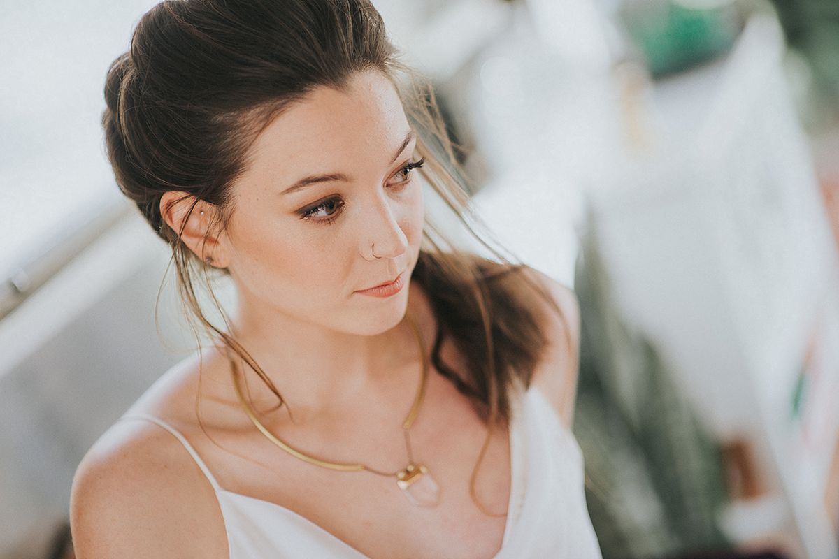 makeup leah Francesca / photography Jessie casey photography / hair ash pardee / jewelry Nadine medina designs / dress true north bridal / air stream rose & dale photo co. / event designer mary elise rees / couple Lindsay & matt