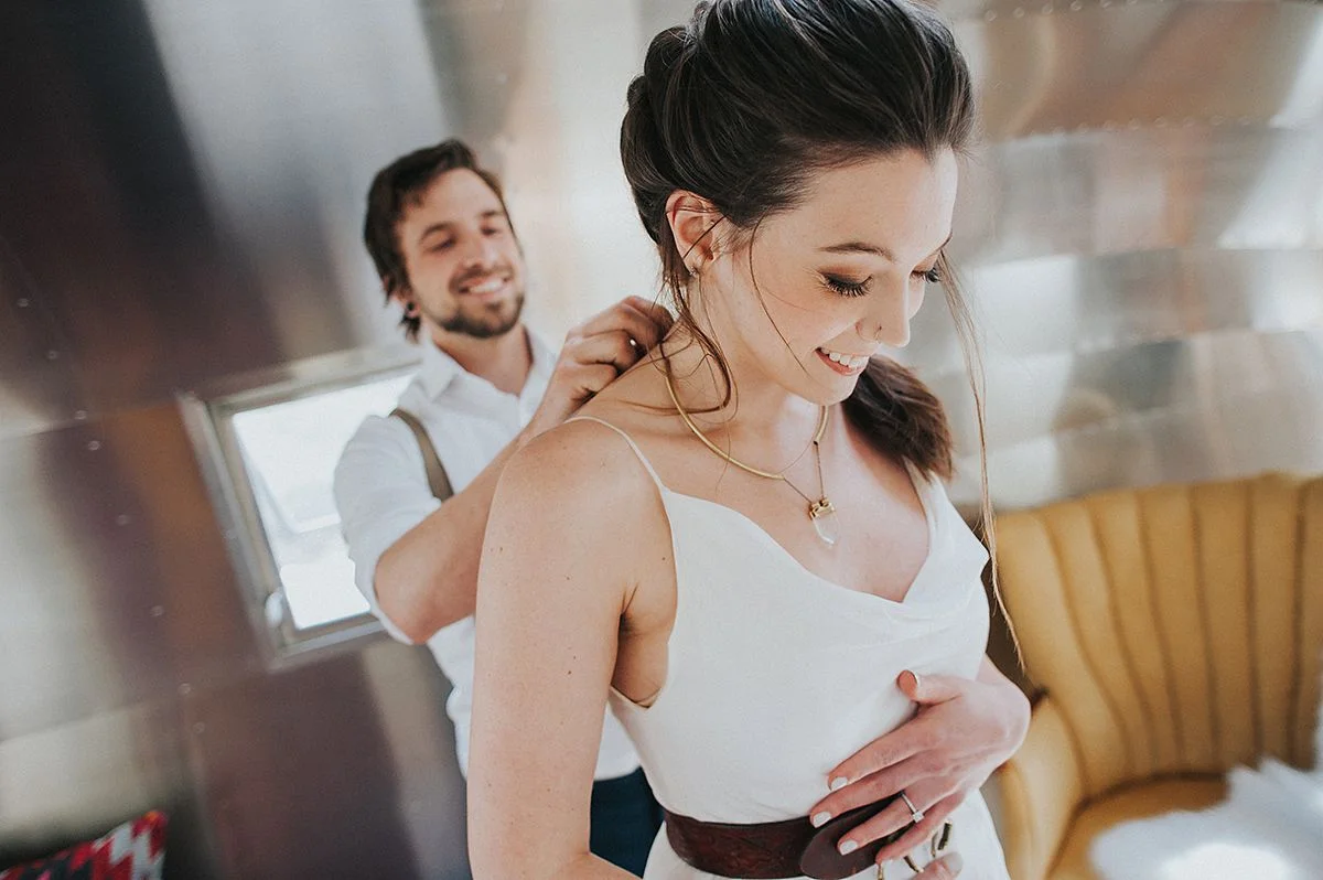 makeup leah Francesca / photography Jessie casey photography / hair ash pardee / jewelry Nadine medina designs / dress true north bridal / air stream rose & dale photo co. / event designer mary elise rees / couple Lindsay & matt