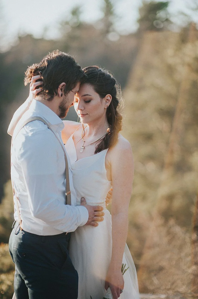 makeup leah Francesca / photography Jessie casey photography / hair ash pardee / jewelry Nadine medina designs / dress true north bridal / air stream rose & dale photo co. / event designer mary elise rees / couple Lindsay & matt