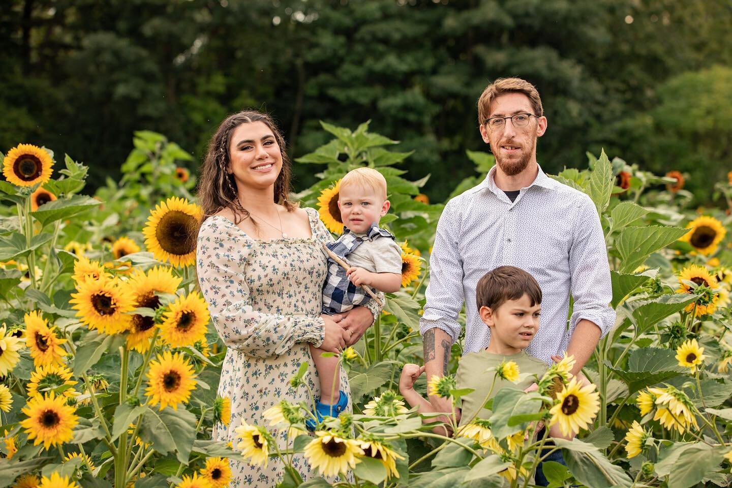From our family sunflower 🌻 shoot with @ashleynizolekphotography the other day!!! I&rsquo;m obsessed!! 😍❤️&zwj;🔥 Thank you so much Ashley for capturing my chaotic but beautiful family ✨🌻 @libertyridgefarmweddings dress: @renttherunway