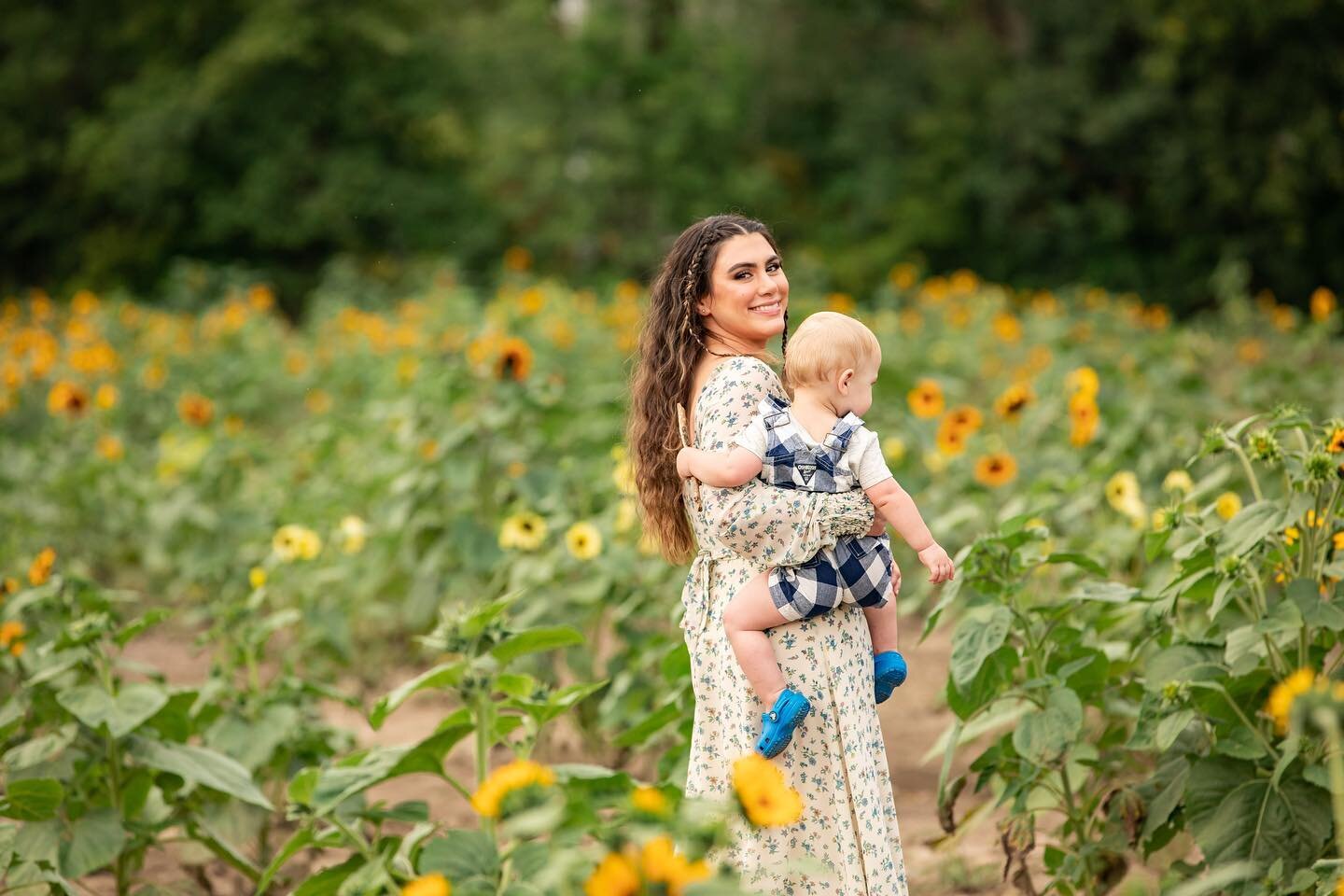 From our family sunflower 🌻 shoot with @ashleynizolekphotography the other day!!! I&rsquo;m obsessed!! 😍❤️&zwj;🔥 Thank you so much Ashley for capturing my chaotic but beautiful family ✨🌻 @libertyridgefarmweddings dress: @renttherunway