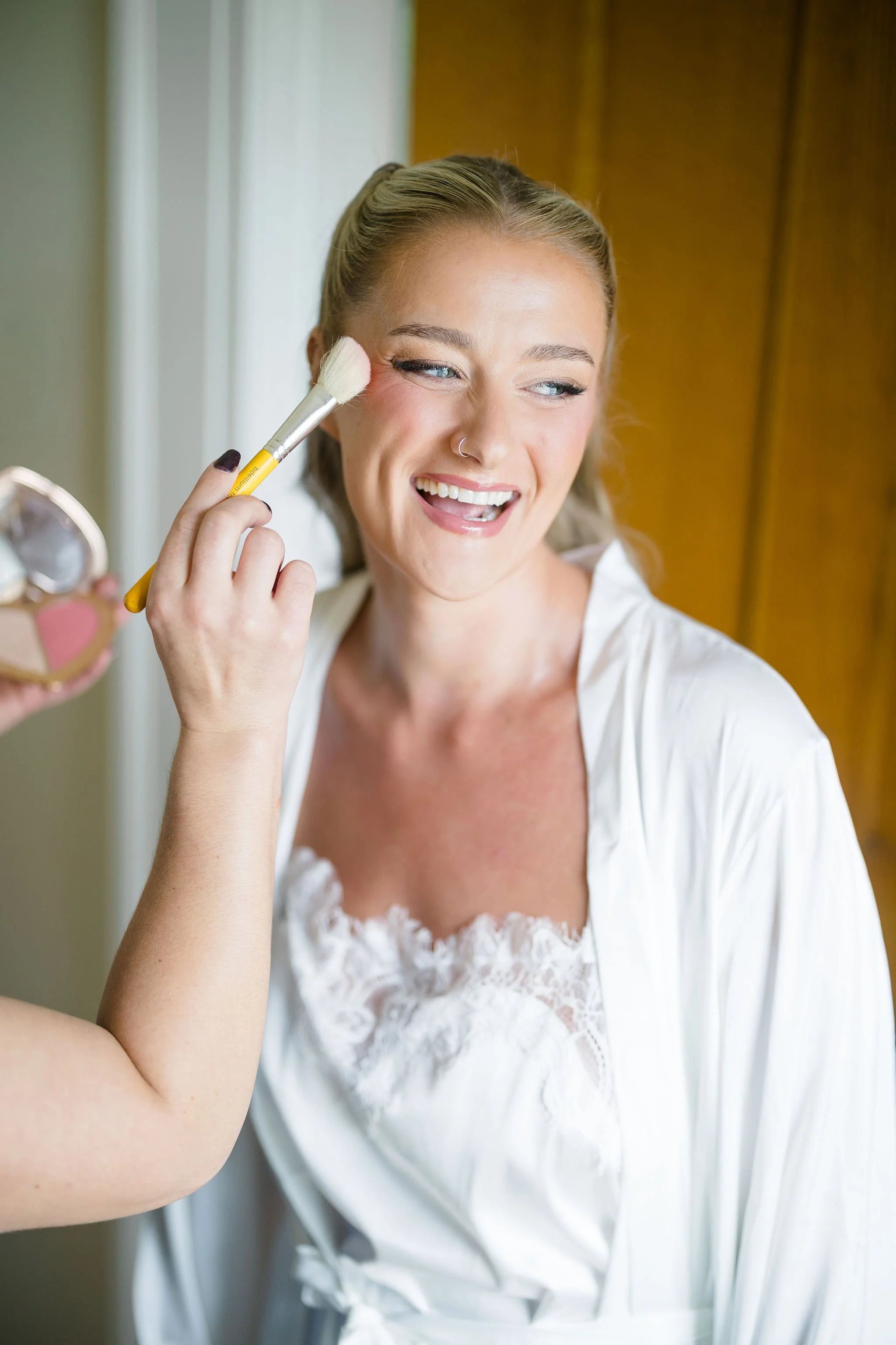 Bride getting ready with luxury wedding makeup