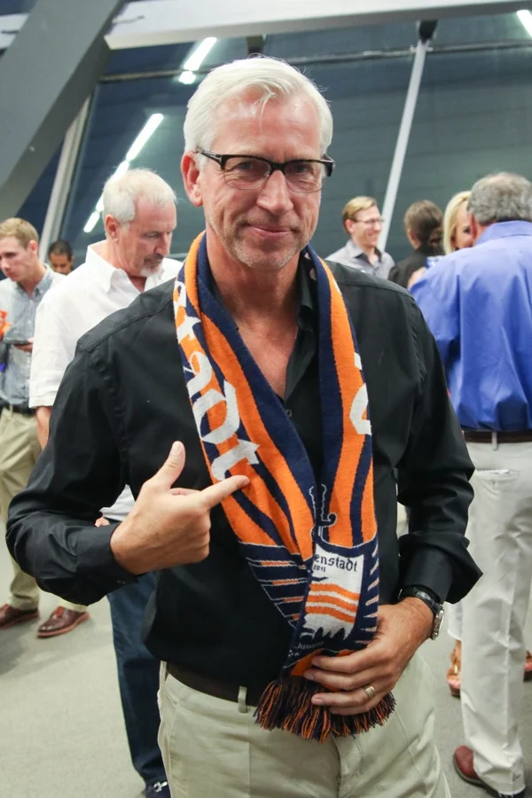 Crystal Palace FC Head Coach Alan Pardew donning a DI scarf.