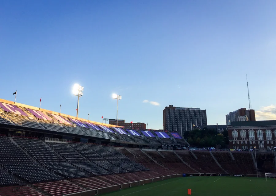 The sun sets on Nippert Stadium following the last match of the season. 