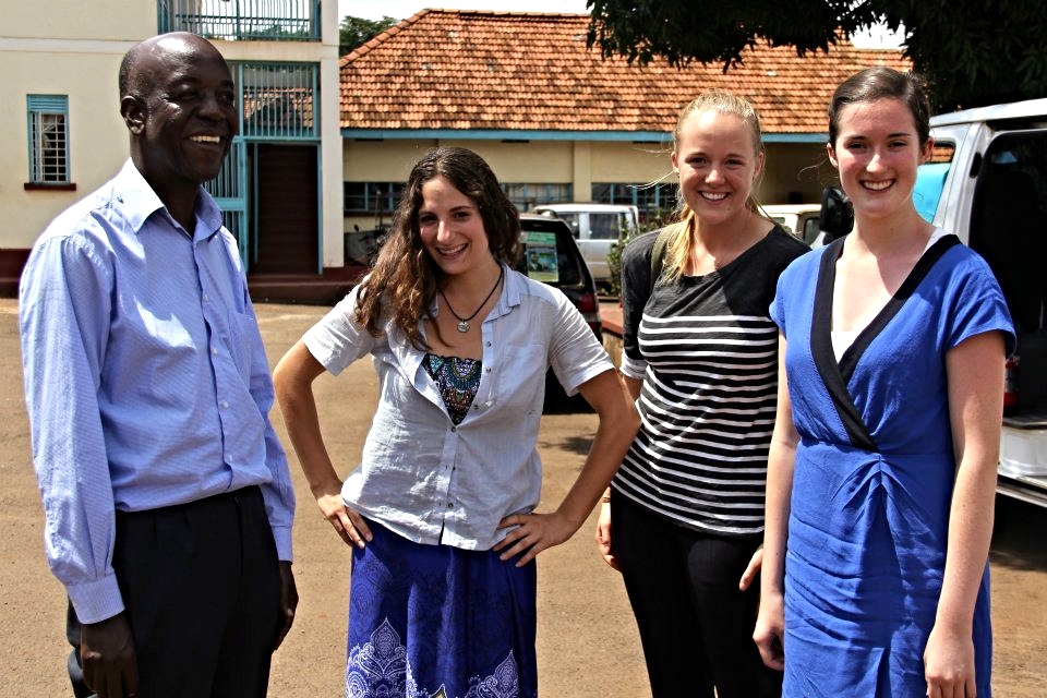 ENFOCO Lab researchers Alyssa Luisi, Colleen Devlin, and Catherine Mahoney with former NaFIRRI Director John Balirwa.