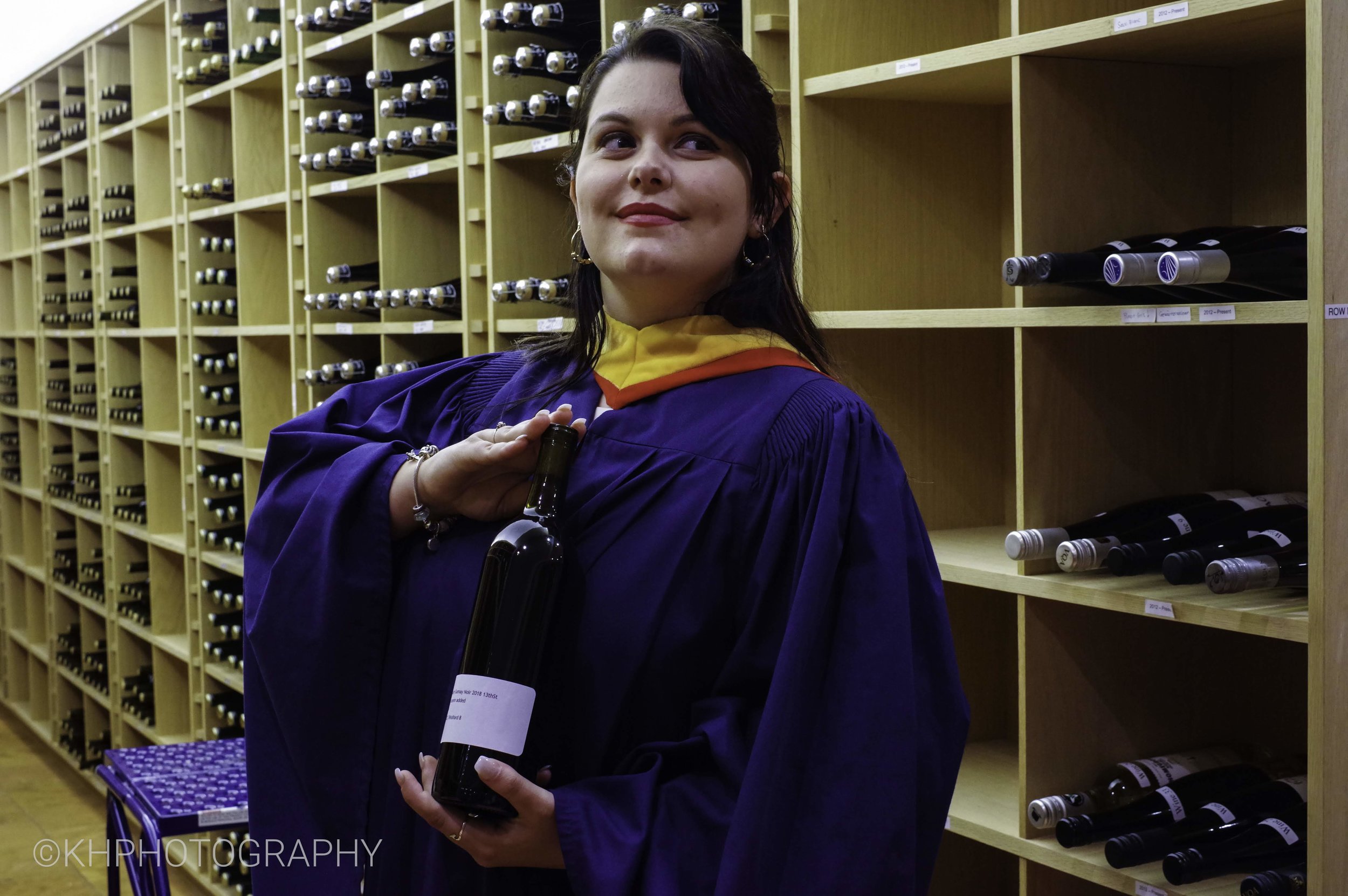 That is one of my thesis Gamay Noir wines that I made in October that I’m holding. We got to go into the very limited access and alarmed cellar of commercial and research wine.