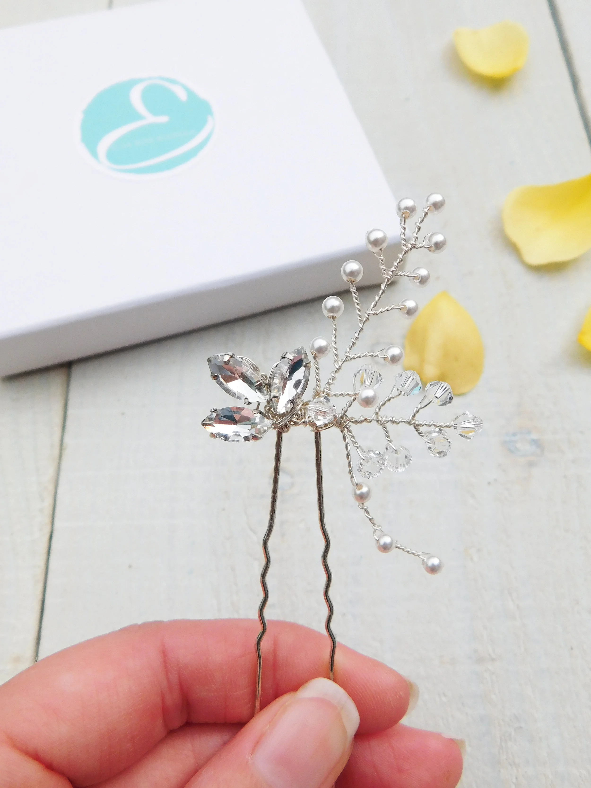 Group hair pins together or opt for a single statement pin