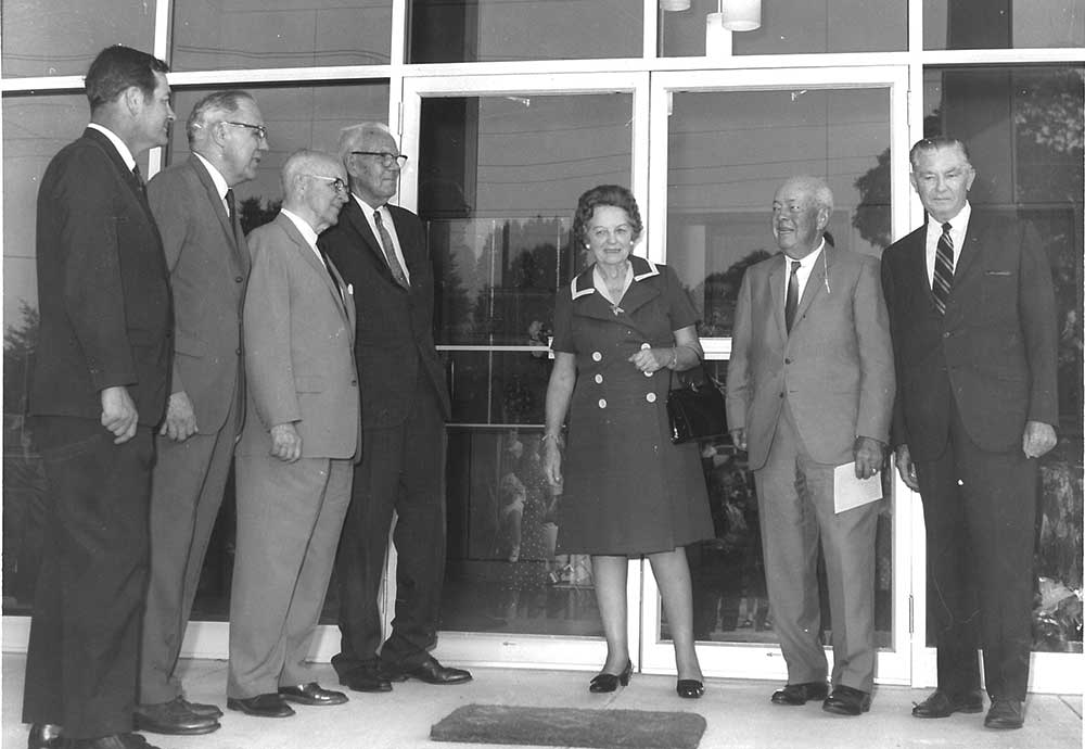 Dedication of new administration building, featuring (L to R) Troy Chamber of Commerce Pres. John Gibson, Hobson Shirey, Frank Spain, Leo Bashinsky (building donor), Mrs. Yetta Samford, Frank P. Samford (for whom Samford University is named), and Roy E. Jeffcoat, ABCH trustee