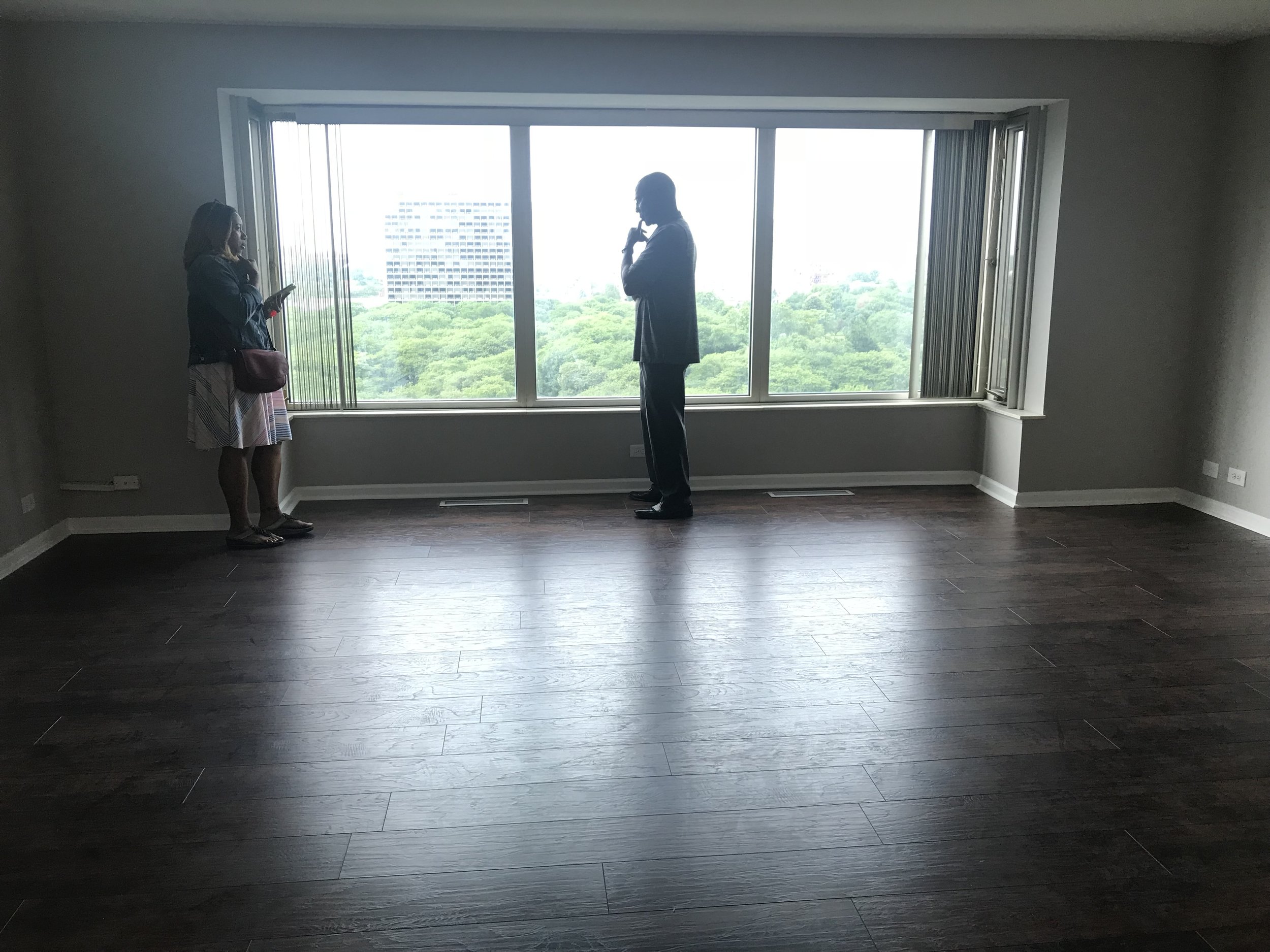 Toni Jennings of Abode Detroit speaking with my dad about the makeup and history of the building.