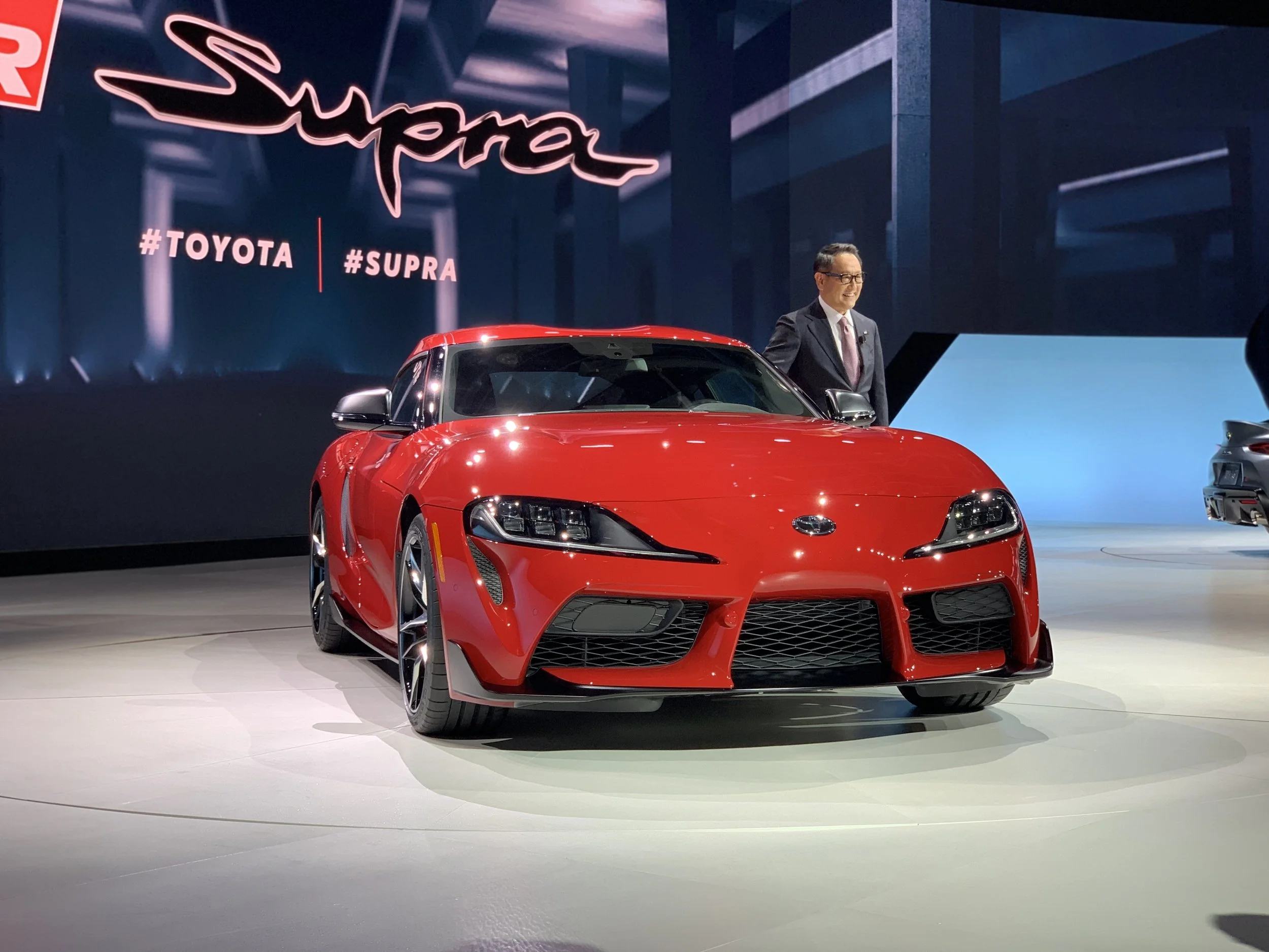 Toyota CEO Akio Toyoda smiled for the cameras as he introduced the new Toyota Supra.