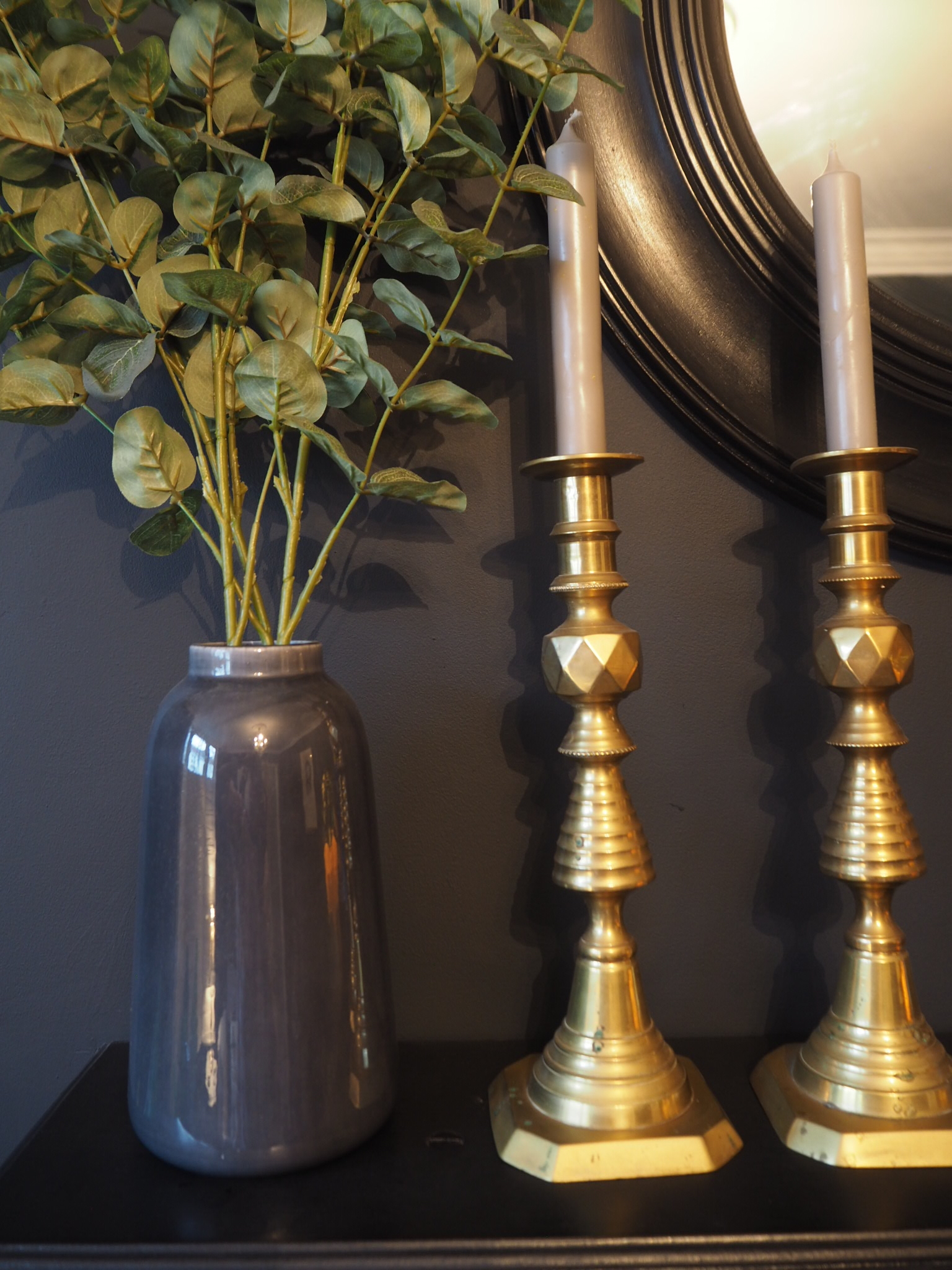 Brass candle sticks and grey/ teal vase and faux flowers 