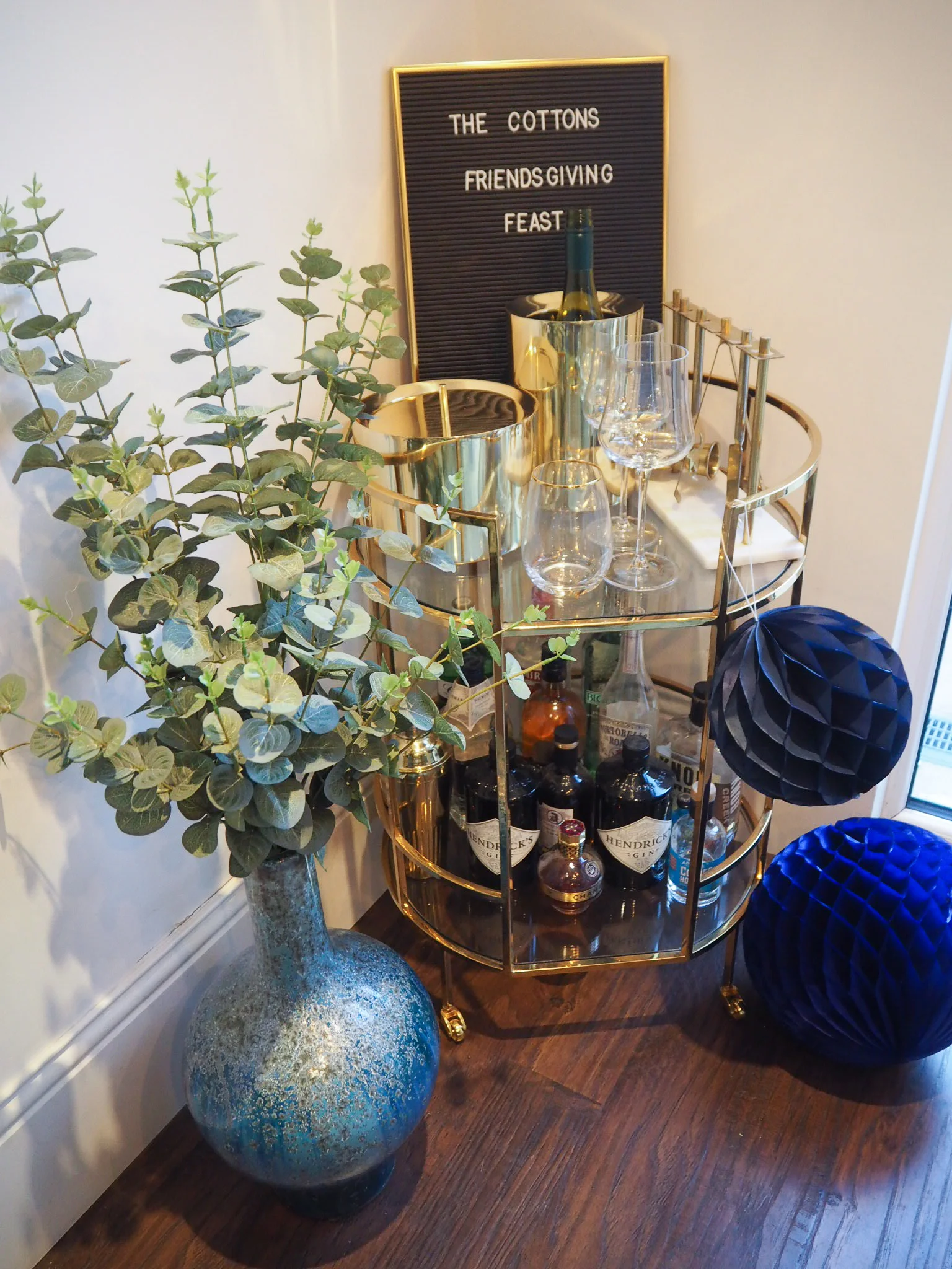 Blue Reactive glaze vase £79 from West Elm; Brass ice bucket £69, from West Elm; Brass wine cooler £49 from West Elm