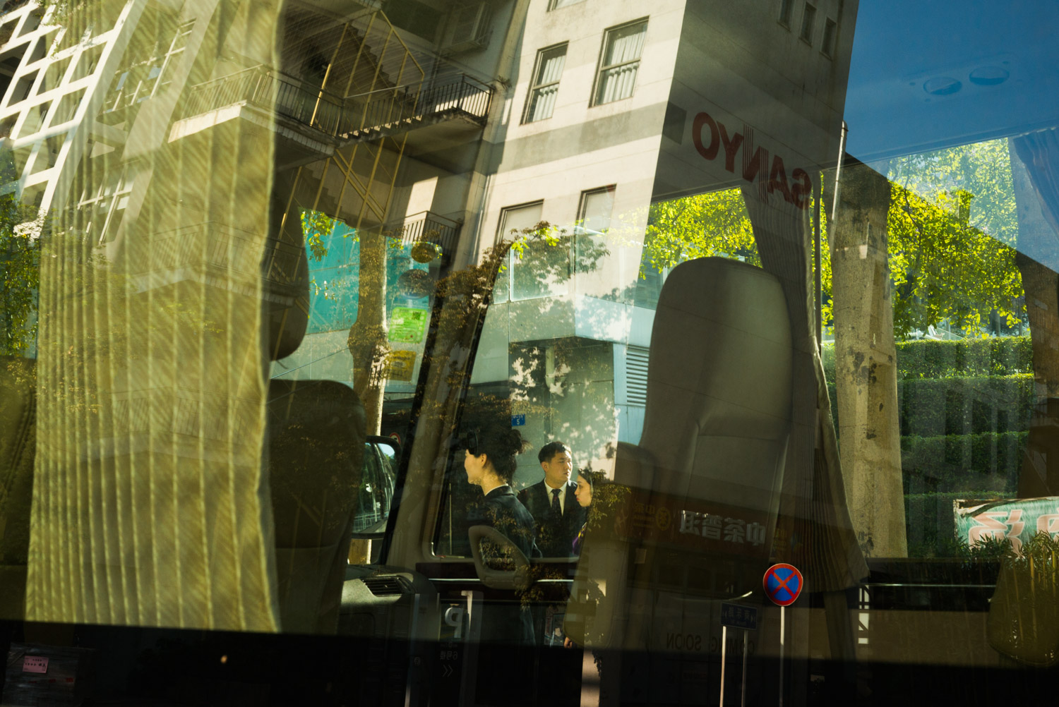 people framed within a car window.jpg